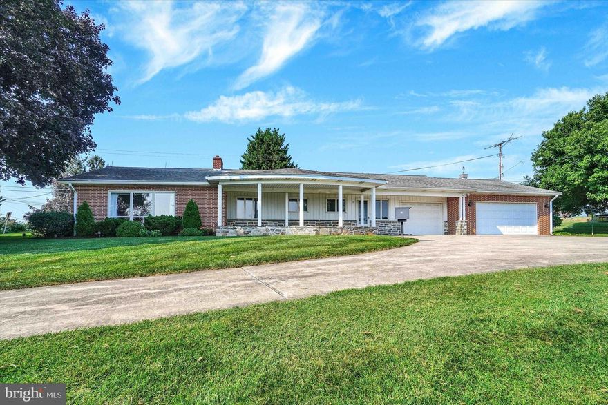 This is probably one of the most well built homes I've had the pleasure of selling. It has only been lived in by the original 2 owners. Over the years it has been absolutely cared for and maintained top to bottom and looks like the day they moved in. This beautiful stone and brick home has a heated one car attached garage as well as a 2 car attached garage. Covered front porch overlooks beautiful farm fields.  This is a solid plaster wall home with hardwood and carpet flooring.  You'll find a very large basement with a pool table and small wet bar(included in the sale).  Office in the basement also.  Drive up the nice wide concrete driveway and choose either the heated 1 car garage or the 2 car garage or enter through the beautiful stone floor breezeway.  There's a nice kitchen and dining room leading to a huge living room.  3 bedrooms with built in closet spaces. All solid plaster interior even the garages.  Outside you will find a whole house generator on propane (tanks are owned and will convey).  Super nice manicured lawn all around this fine home.  Walk across the street and jump in the pool at Shanbergers swimming pool on hot days, it's a public pool. Overall a lovely home I'm sure you will love. Turn left out the driveway and it's a quarter mile to Md. and about 17 miles to Bel Air Md. and not too far to Aberdeen proving ground.