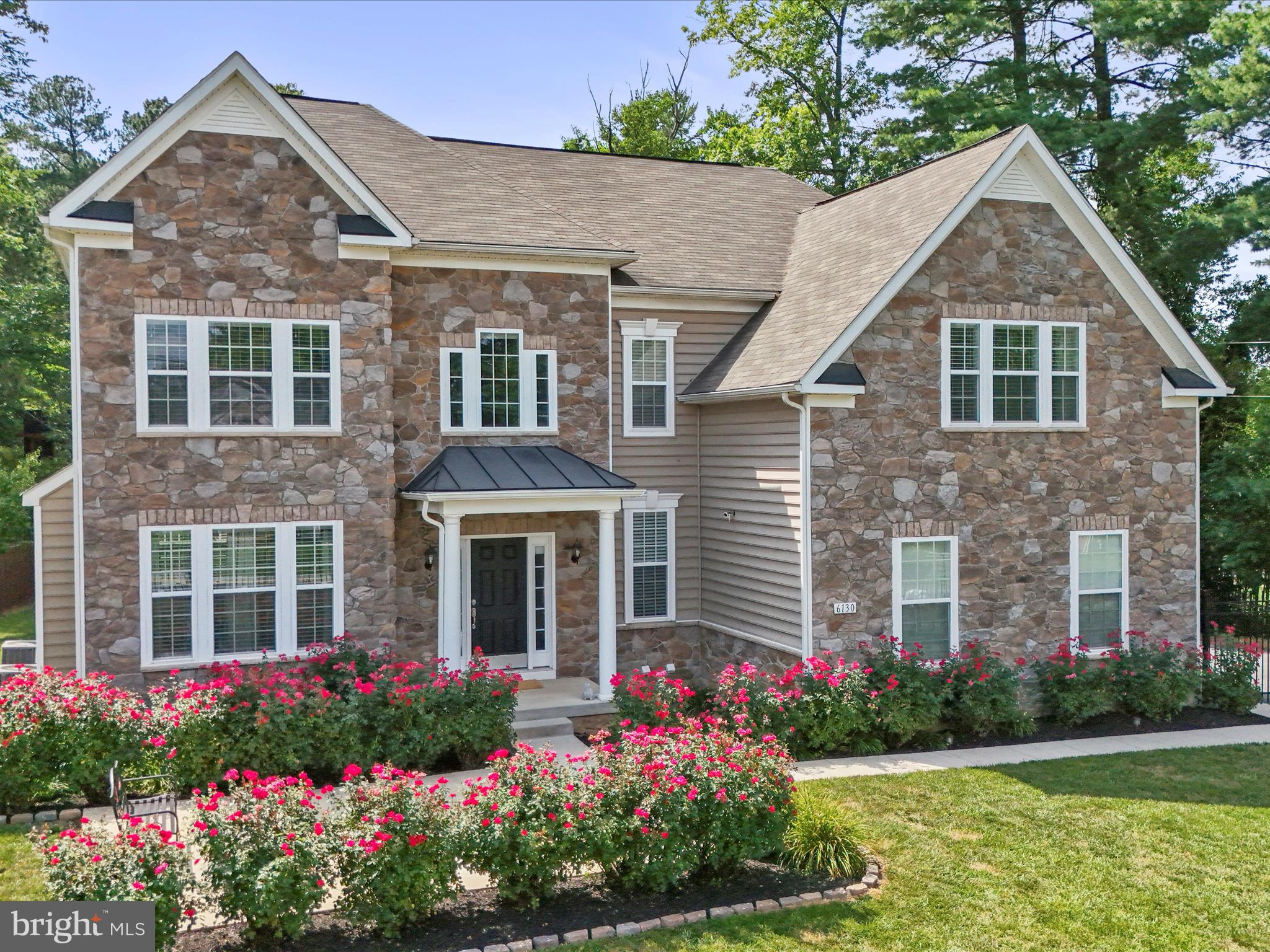 This stunning stone front colonial offers over 4,500 square feet of beautifully finished living space in the sought-after Oakdale School District. With four spacious bedrooms and four full baths, there's room for everyone—and then some.
Step into a dramatic two-story foyer with a striking turned staircase and wrought iron spindles. Gleaming hardwood floors flow throughout the main level, leading you to the heart of the home: a gourmet kitchen with a large center island, 42" cabinetry, granite counters, stainless steel appliances, gas cooktop, and double wall ovens. The sunny breakfast room, surrounded by windows, opens to a freshly painted deck—perfect for summer evenings.
Off the kitchen, the family room features a cozy gas fireplace, while the formal dining room with crown molding and chair rail is ideal for special occasions. A separate formal living room offers even more space to gather or unwind.
Upstairs, the oversized primary suite wows with tray ceilings, a sitting area, a custom walk-in closet, and a luxurious en-suite bath with dual vanities, a soaking tub, and a walk-in tiled shower. Three more generously sized bedrooms—two with walk-in closets—a full hall bath, and convenient upper-level laundry complete the space.
The finished walk-up basement adds serious flexibility with an open layout, full bath, and a bonus bump-out—perfect for a home office or gym. There’s also a large utility/storage room.
Other highlights include an oversized two-car garage, no HOA, and a prime location just minutes from Weis Market, Anytime Fitness, local dining, and commuter routes like I-70 and I-270.
Stylish, spacious, and move-in ready—this home truly has it all.