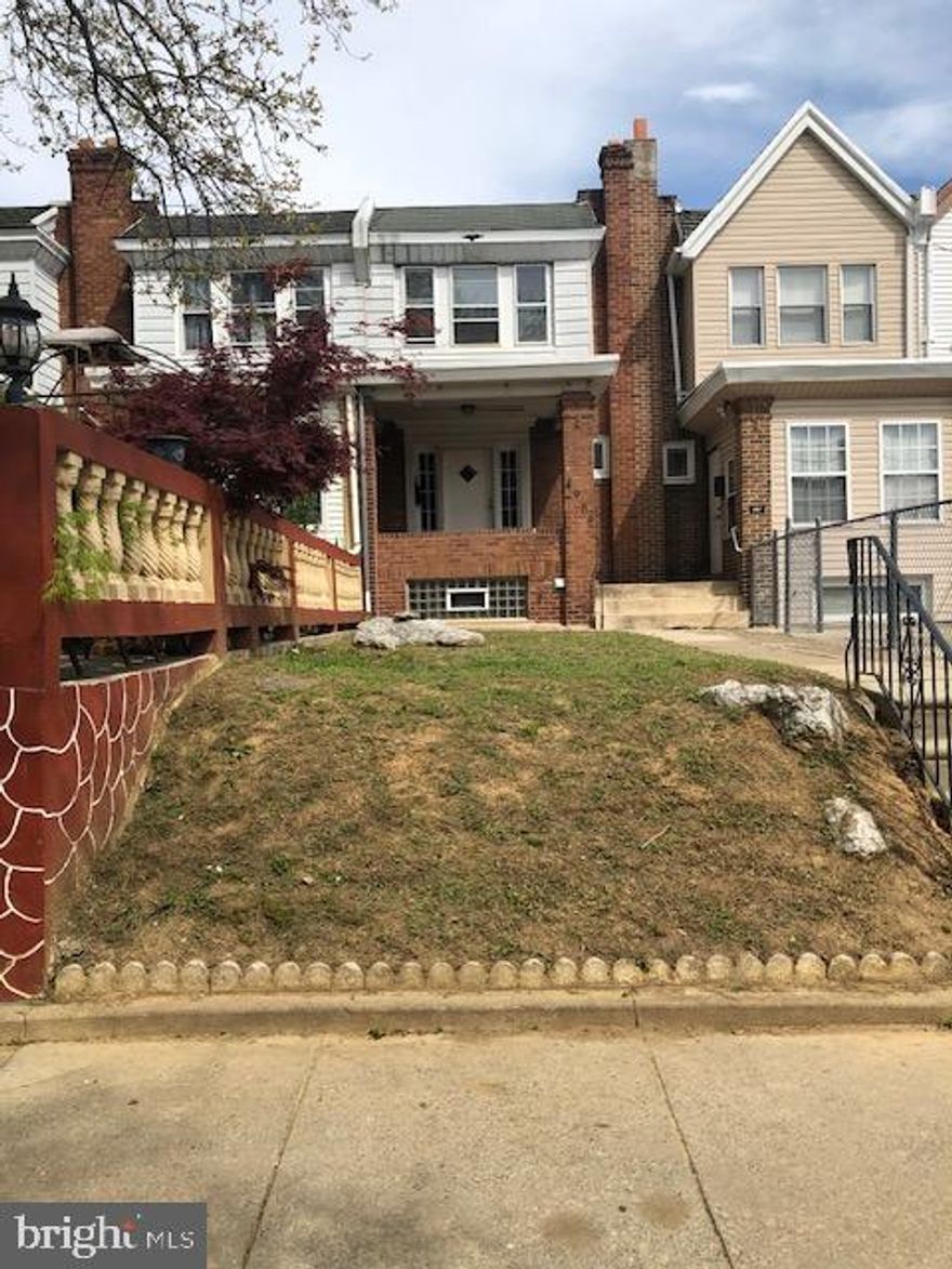 Opportunity is knocking!  Great fixer upper for first time buyer or investor - this 3 BR, 1 Bath row on a nice block needs some updating but offers a great opportunity for some sweat equity.  Standard sales in this area in good condition are selling for $175K average,  and rents for a 3 BR average $1500 to $2000, so check out this opportunity for a great investment.  Home features hardwood floors on 1st and 2nd floor, open front porch and attractive front yard, a rear driveway and rear garage (accessible from inside the basement.)  Kitchen features an exterior door to a small balcony deck (which needs stabilizing).   Interior work needed, includes paint, refinishing wood floors, basement parging and updating the kitchen and bath.  Being sold "AS-IS".  Cash Buyers preferred.