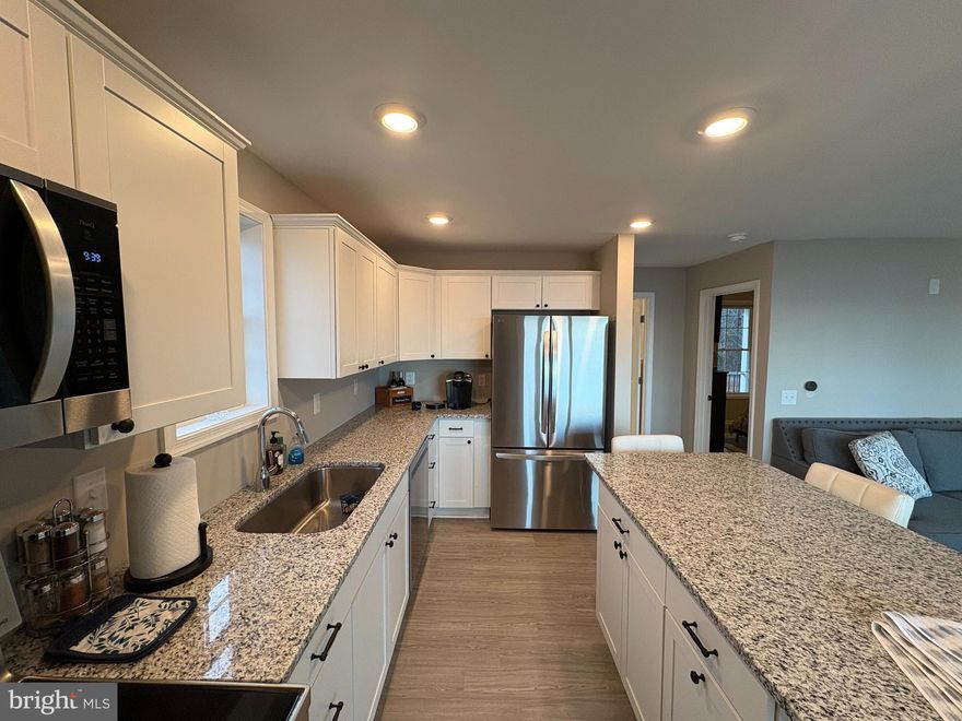 🌊 Potomac River Lifestyle in the Heart of Virginia’s Northern Neck
Welcome to 1077 N Independence Dr — your gateway to relaxed river living and everyday escape.
<br><br>
Nestled in the scenic Northern Neck of Virginia, this inviting home offers the perfect blend of comfort, natural beauty, and community amenities—ideal for a full-time residence, weekend retreat, or investment opportunity. Enjoy the peaceful rhythm of life near the Potomac River, where water views, fresh breezes, and unforgettable sunrises and sunsets become part of your daily routine.
<br><br>
Step inside to a light-filled interior designed for easy living and entertaining. This 3-bedroom, 2-bath home has undergone a complete, top-to-bottom renovation in 2024, thoughtfully redesigned to maximize space, functionality, and enjoyment of the surrounding river landscape. The result is a home that feels entirely new—because it essentially is. Nestled on the scenic Potomac River, with arguably the best river views in the state, as part of the renovation, the kitchen and main-level bathroom were expanded, creating more open, usable living space and allowing for a better overall layout. Systems and finishes were replaced, and every major component was upgraded—new appliances, new bathrooms, new flooring, new fixtures, new roof, and a completely redesigned kitchen and bath—all with an emphasis on quality, comfort, and timeless style. Enjoy 180-degree panoramic river views from two expansive porches, a sun deck, and a cozy seating area complete with a fire pit, with occasional sailboats gliding by and on lucky days dolphins playing in the water. Large windows invite the outdoors in, creating a bright and airy atmosphere that pairs beautifully with the surrounding natural landscape. Whether you’re hosting friends, enjoying a quiet morning coffee, or unwinding after a day on the water, this home offers the perfect setting to relax and recharge.
<br><br>
✨ Highlights of the Lifestyle
River & Nature Views: Enjoy the beauty of the Potomac and surrounding greenery from your own home, with peaceful views that change with every season.
<br><br>
Indoor–Outdoor Living: Perfect for morning coffee, evening gatherings, grilling, and relaxing under the stars.
<br><br>
Fully Furnished: Move right in and begin enjoying the home immediately as a second home or rental—furnishings convey a true turnkey opportunity.
<br><br>
Community Amenities: Located in a desirable neighborhood offering access to community beaches, marina, pool, clubhouse, and recreational facilities—ideal for both relaxation and staying active.
<br><br>
Endless Recreation: Nearby options include boating, fishing, kayaking, fossil hunting, hiking, and exploring charming waterfront towns, wineries, and local shops.
<br><br>
Convenient Getaway: Just a few hours from Washington, D.C., Northern Virginia, and Fredericksburg, making this an easy escape from city life with strong appeal for short-term rental demand.
<br><br>
Whether you’re searching for a serene primary residence, a vacation home, or a turnkey investment opportunity, 1077 N Independence Dr delivers the lifestyle buyers dream of when they think of river living in the Northern Neck. Come experience the calm, the views, and the sense of retreat—this is more than a home, it’s a destination!