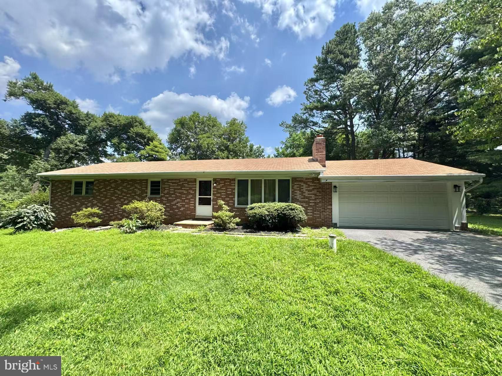 Beautifully Updated 4-Bedroom, 2.5-Bath Rancher on Nearly 1 Acre
This move-in-ready 4-bedroom, 2.5-bath rancher sits on a private 0.93-acre wooded lot, offering modern updates, spacious living, and outdoor charm.
The bright living room features hardwood floors, large windows, and a cozy wood-burning fireplace. The fully remodeled kitchen includes updated cabinetry, pantry, and a refrigerator.
The primary suite offers a private bath with a walk-in shower. Three additional bedrooms share a full hall bath. The fully remodeled basement includes a guest half-bath, walk-out access to the backyard, a laundry area with washer and dryer, and ample storage.
With NO WATER BILL thanks to private well!
Enjoy the converted sunroom—a large, fully finished, NEW climate-controlled space (11'8" x 44'7") perfect for a playroom, office, or second living area.
The remodeled garage features an ultra-quiet garage door, adding convenience and comfort.
Enjoy the expansive backyard with a storage shed and playground area, all surrounded by mature trees.
Recent updates include:
• Fully remodeled kitchen with refrigerator
• Remodeled garage with ultra-quiet garage door
• Updated bathrooms (2.5 total)
• Newer HVAC & water heater
• Washer & dryer included
• 220V EV charging outlet
A perfect blend of style, space, and function—ready to welcome you home!
All offers due by July 31. Seller prefers settlement on or after September 1.