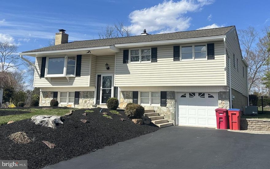 Welcome to 13 Dorchester Road, a beautifully kept home at an ideal location in Collegeville which enjoys immediate access to major highways, including Routes 422, 76, 202, and the PA turnpike! 

For outdoor recreation, the Evansburg State and Valley Forge National Parks are conveniently located nearby, as is the amazing Schuylkill River Trail. Retail shopping is also accessible at the Providence Town Center, while the King of Prussia Mall is only a short drive away. To top it off, Methacton School District serves as the community’s educational hub. 

This charming property has undergone extensive renovations, both inside and out. The 1992 expansion added a large Primary Suite with an en-suite bathroom and walk-in closet. The primary bathroom was further upgraded in 2008 with a heated floor. The remaining bedrooms on the main floor are spacious and well-appointed, being serviced by an elegant second full bathroom, which was updated in 2014. 

The addition also further expanded the kitchen and dining areas with the kitchen undergoing a comprehensive remodel in 2017, transforming it into a bright and contemporary space designed for both cooking and entertaining, and featuring an outdoor balcony overlooking the tranquil hardscaped patio.  Hardwood floors accent the open spaces throughout the kitchen, dining room, living room, and primary suite. 

The 1992 addition also includes a substantial storage room located behind the garage, an updated bedroom/multi-purpose room with access to the enclosed porch, a den equipped with a gas fireplace, and another room that can serve as an office or workout space. This level features updated luxury vinyl flooring throughout. 

Stepping into the enclosed heated/cooled porch, you will be ushered outside to a resort-style backyard oasis, featuring a spacious lower-level patio with a fire pit, a serene waterfall, a curved sandstone stairway to your in-ground pool, and an upper bar and entertainment area. The pool is surrounded by lush landscaping, providing a relaxing ambiance.        

The roof, which has a transferable lifetime warranty, and new gutters were installed in 2020. In 2021, two battery-backed-up sump pump systems in the garage and storage room were added. 

This is a move-in ready, must-see home, so schedule your tour today!