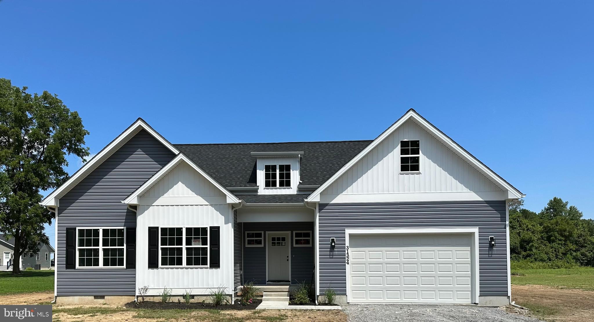 BRAND NEW HOME - Constructed by DELMAR CONSTRUCTION
Welcome to your dream home in Cordova, Maryland! This brand-new construction boasts 4 bedrooms, 2 bathrooms, and 1,850 square feet of exquisite living space. An attached 2-car garage offers ample storage and convenience. The main level features luxury vinyl floors, with plush carpeting in the bedrooms.
The kitchen is a chef’s paradise with vaulted ceilings, 42" white shaker cabinets, a tile backsplash, granite countertops, stainless steel appliances, and a large island perfect for entertaining. Recessed lighting throughout the home adds a touch of elegance.
The LARGE primary suite is a sanctuary featuring tray ceilings, recessed lighting, a spacious walk-in closet, an oversized shower with custom tile surround, and a double bowl vanity sink. The home also includes a large open foyer and a convenient laundry/mud room on the main level with entry to the garage.
Sitting on a beautiful .45-acre lot, this home features new well and septic systems, as well as all new electrical, plumbing, and HVAC systems. With 2 x 6 framing for extra insulation and 50-year architectural shingles, this home is built for efficiency and durability. Relax on the covered front porch and enjoy your new lifestyle in Cordova!
BUILDER INCENTIVES AVAILABLE!
***Pictures and plans may not depict the actual home and should be considered a representation***
*** AGENT OWNED***