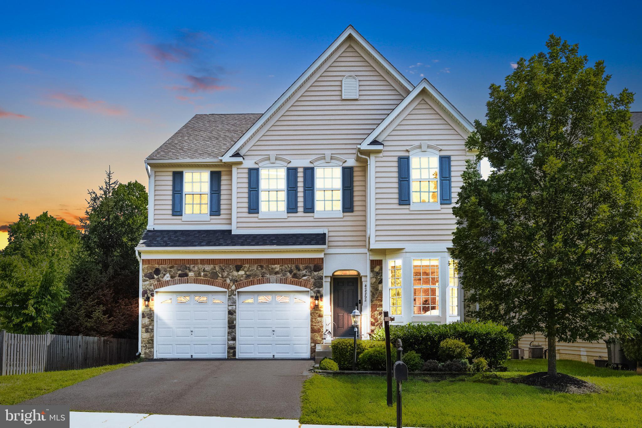 Welcome to this stunning 5-bedroom, 4.5-bath in the sought-after Pines at Treburg community nestled between Stone Ridge and South Riding. Located on a premium lot backing to trees, it features hardwood floors on the main level, a two-car garage, and a custom composite deck with a gazebo perfect for outdoor entertaining.
The main level, which has been freshly painted, includes a formal living and dining room, a cozy family room with a gas fireplace, and a gourmet kitchen with stainless steel appliances, granite countertops, and updated cabinetry. Upstairs, you'll find four spacious bedrooms with walk-in closets, including one suite with it's own bathroom and spacious luxurious owner suite with a large soaking tub and double vanities. The finished lower level boasts a home theater, wet bar, guest bedroom, and walk-up access to the backyard. This beautifully maintained home combines stylish living spaces with great outdoor amenities, Conveniently located near Route 50, Dulles Airport and 267 Toll Road.