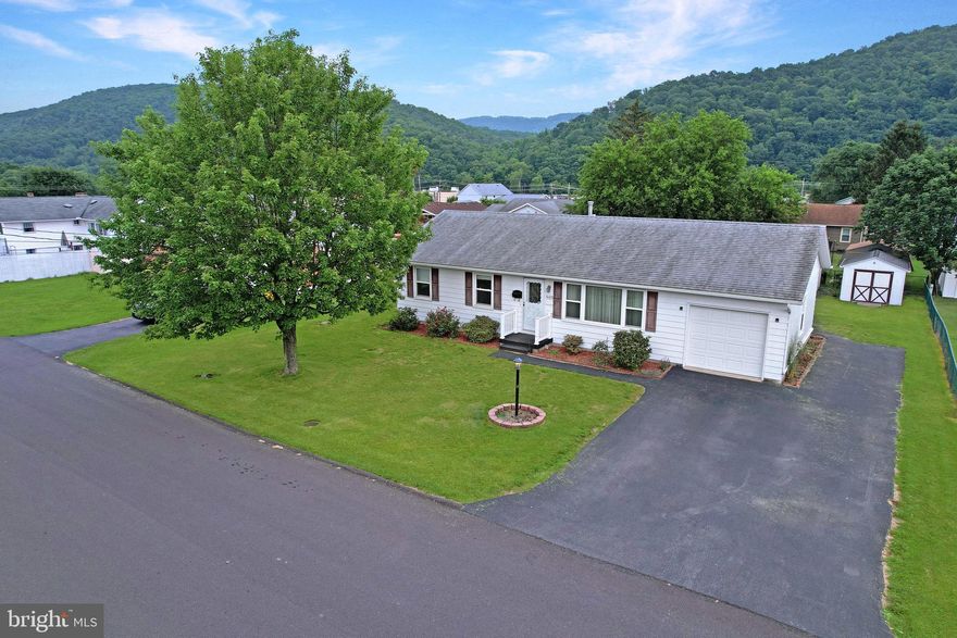 SINGLE LEVEL LIVING with an attached garage!!! Great for downsizing or even a starter home! This home offers 2 living rooms, one of which comes equipped with a cozy fireplace adjoining a screened in porch where you can enjoy your beautiful, flat back yard with not only one but TWO Placka Storage Sheds! There's no need to buy kitchen appliances because they're already here and parking is a breeze when entertaining with a paved, off-street, driveway on the side of the home. This home is conveniently located within minutes of WVU Medicine/Potomac Valley Hospital and Potomac State College of WVU!
*This property is being sold AS IS.*