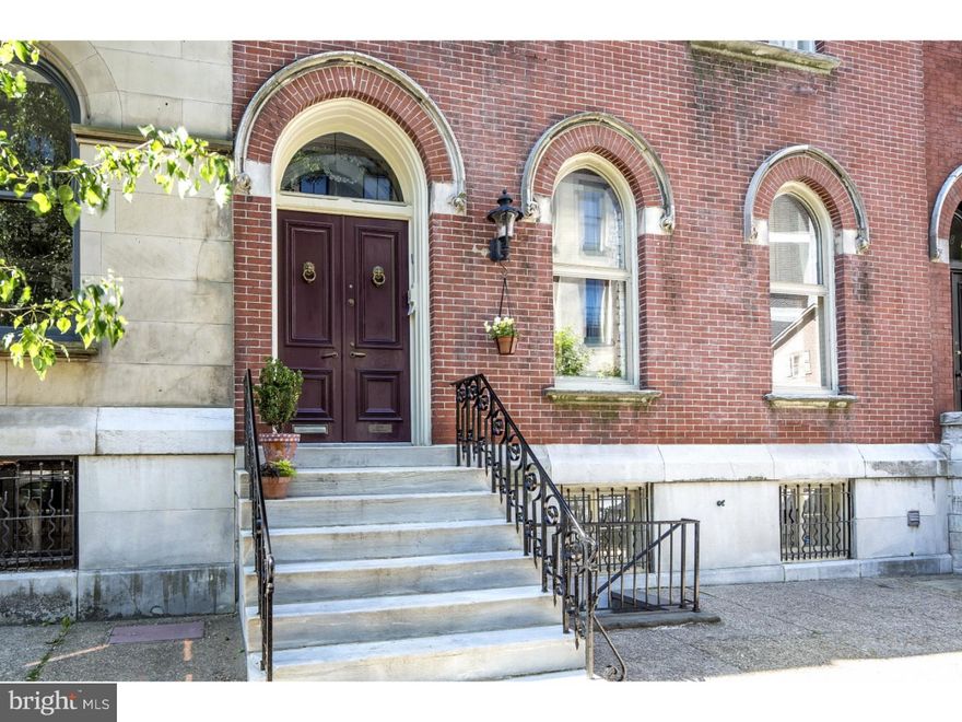 This grand Gothic Revival home (c. 1862) with remarkable space and abundant character offers dramatic ceiling heights; superior width (25' feet wide), and a most lovely brick garden, all on a sought-after, tree-lined block in Philadelphia's historic Rittenhouse Square. Featuring 5 bedrooms, plus Family Room, 3.5 baths and a fully separate ground level apartment (with separate street access and interior stairs as well) that presents an ideal opportunity for multi-generational living, guests, or other full or part time occupants (or simply incorporate the space into the home as a superb family entertaining area). 1 year pre-paid PARKING within 1 block (self-park GARAGE, where seller has parked for years). Just a wonderful home - 11' ceilings on both the 1st and 2nd floor; spectacular southern light along the entire rear face; and original detail, moldings, and hardwood floors. The home features a grand, 3-story staircase topped by a big, bright skylight; significant arched windows along the historic facade; original shutters; 6 fireplaces with beautiful mantles; and original doors. The wonderful 1st floor plan includes a big kitchen (with newer appliances), a very spacious living area and breakfast area, and a lovely dining room. Taking full advantage of the 25' width, this home offers big rooms throughout, including a huge master bedroom suite and terrific family room. 3-zone HVAC. Excellent closets and storage. This amazing Philadelphia home is featured in Historic Rittenhouse, A Philadelphia Neighborhood (Univ. of Pennsylvania Press, 1985), and is on the Philadelphia Historic Register. Spectacular volume, space, and bones on a premier Rittenhouse block, a short walk to the Square, Schuylkill River Park (with park, dog park, River Trail and Boardwalk), Fitler Square, and the best restaurants, cafes, and shopping in Center City. Easy walk to Penn, Drexel, HUP & CHOP. In the Greenfield School catchment and with convenient, walkable, access to The Philadelphia School, Friends Select, both Greene Town and Clementine Montessori schools, and Trinity, along with many popular day cares. 98 WalkScore. 100 TransitScore. 99 BikeScore. NOTE--1 year pre-paid PARKING within 1 block (self-park GARAGE, where seller has parked for years).
