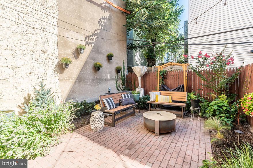 Unbelievable price for such an incredible home! Take advantage of this opportunity! Can never have too much space: Unique 18 foot wide property in Center City Southwest - Graduate Hospital. Centrally located - great access to all areas and transit. 3 story red brick facade - spacious, open and inviting. The main floor transitions well with an open concept from living to dining.  Modern, updated kitchen leading out to expansive backyard - brick pavers and beautiful gardening set the mood for outdoor entertaining and relaxation. 3rd floor primary bedroom with en suite bathroom. Shower, soaking tub and double vanity. Private deck off of the primary bedroom  overlooking the vast backyard  is your second outdoor space at this amazing property. Two secondary bedrooms large enough for queen size beds. Bonus flex space on the second floor, perfect for an office setting, separate from the bedrooms. Washer dryer conveniently located upstairs. Two Zoned HVAC and double water heaters for efficiency.  Fully finished basement with amazing storage currently fitted out as a private gym.  Local favorites nearby include: Sprouts farmers market, shops at Lincoln Square,  L'anima , Founding Fathers, Loco Pez and many others just a short walk away. This home is a rare find due to its size, location and all of the incredible features it has to offer.  Let us know how we can help with your financing ! We can buy down your lenders rate.  Seller is motivated !