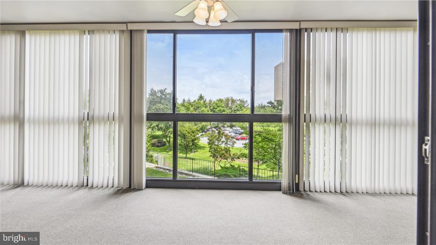 THE LOCK HAS BEEN REPAIRED -NEW PRICE - 55+ Active Senior Living. -- Bring your IMAGINATION to this spacious "S" model.  2 Bedroom Suites and a Den - add a privacy screen and have an office space; add book shelves and a comfy chair and have a quiet library; hang a TV screen and add a lounge chair and have a spacious TV/Movie Room. Newly Painted and Carpeted throughout. Refreshed Table Space Kitchen with laminate flooring, updated appliances, tile backsplash and under cabinet lighting.  Extra Storage Closet for storing your Bulk purchases.  The Adjacent  Separate Formal Dining Room has room for family gatherings and the huge Living Room  offers a multitude of possible arrangements. The spacious Sun Room provides Year 'round space (heat and a/c vent).  Enjoy the changing views of the Seasons from both bedrooms as well as the Living Room.  The Guest Suite provides privacy.   The Primary Suite is secluded from the main living area; the  Bathroom has Step in Shower and new Vanity.   Lots of closet space in this unit plus extra storage cage in the building storage room. Don't forget the all the  Leisure world Amenities - two clubhouses, Restaurants and Lounge, indoor and outdoor Pool, Fitness center, Library, Meeting rooms, Newspaper, Medical Center, Bus Service, Security, Garden plots, Clubs and Organizations for every interest....