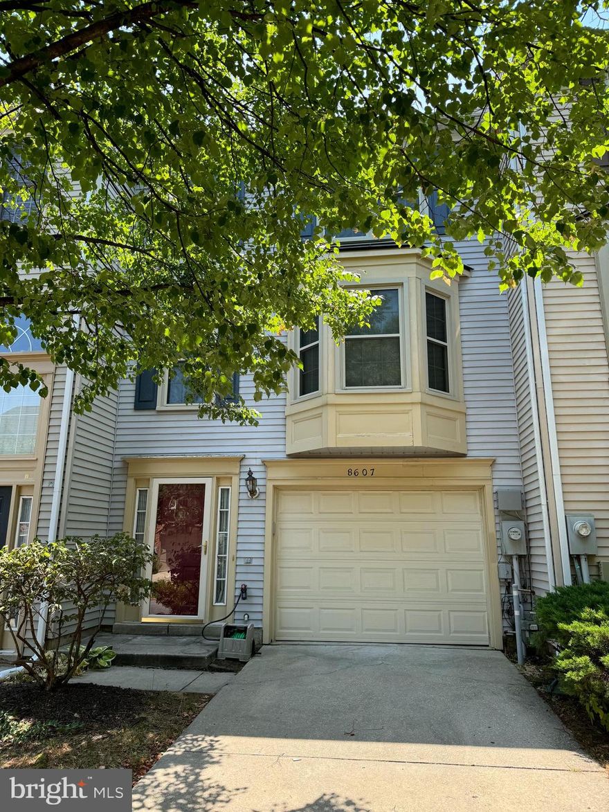PRICE IMPROVEMENT ‼️‼️Discover this charming and well-maintained Trafalgar townhome in the coveted Russett community of Laurel, MD. This home in Anne Arundel County's most sought-after neighborhoods is move-in ready and features numerous unique touches. The family room boasts a cozy gas fireplace, and the modern, eat-in kitchen with bay windows is filled with sunshine, perfect for culinary adventures. The private owner's suite offers a deep jet soaking tub, dual sinks, a separate shower, and a large walk-in closet. The main-level family room, adorned with beautiful hardwood floors, provides ample gathering space. The staircase also features hardwood flooring. Recently renovated, the home includes two full baths and two half baths, a new HVAC system, a newer water heater, a washer and dryer, and ceiling fans. Enjoy outdoor living with a deck and patio, plus the convenience of a one-car garage and driveway parking. The Russett community offers exceptional amenities, including pools, tennis courts, a community center, bike trails, walking paths around the lake, basketball courts, and multiple playgrounds. Located just minutes from commuter routes, Ft. Meade, the Marc Train, and BWI Airport, this home combines comfort and convenience, making it the perfect place for you to call home. Don't miss out on this fantastic opportunity—it's here waiting for you!