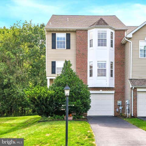 Photo of 74 Hunt Club Drive, COLLEGEVILLE, PA 19426 (MLS # PAMC2190438)