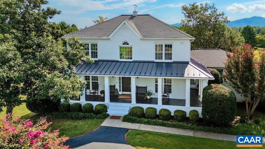 Perched among the rolling hills in the heart of Virginia's wine country, this fully renovated home captures extraordinary panoramic views of the Blue Ridge Mountains across 8+ acres of scenic countryside. Designed for both comfort and elegance, the home features refined interiors, seamless indoor-outdoor living, and an expansive terrace that frames the dramatic mountain backdrop.  A private guest apartment provides ideal accommodations for visitors or extended family. Though privately situated in a serene mountain setting, the property remains just 30 minutes from Charlottesville and the University of Virginia, offering convenient access to acclaimed wineries, dining, and year-round recreation in the heart of Afton.,White Cabinets,Wood Counter,Fireplace in Living Room