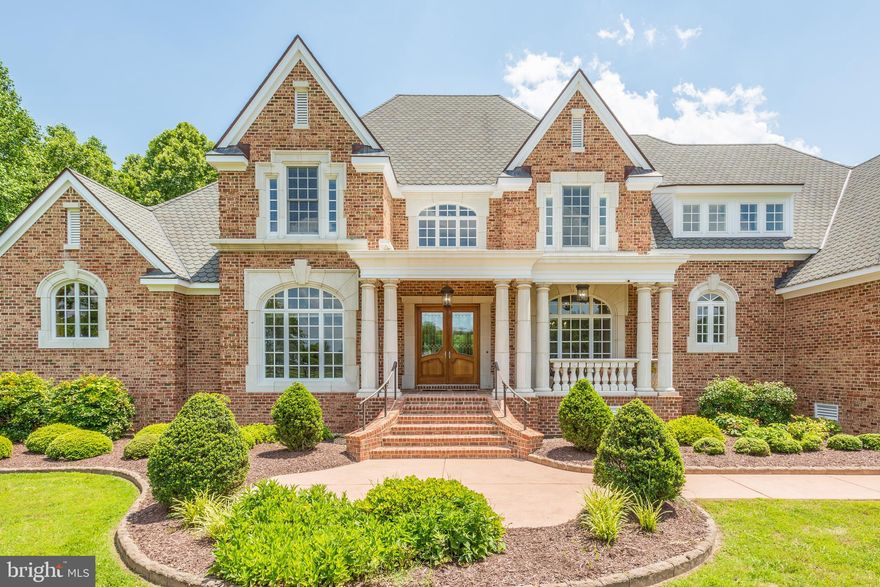 LOOKING for a TURNKEY 45+ ac Equestrian Estate in the Hampton Roads area? Welcome home to this rare gem that offers a Luxury Home for HORSE & HUMAN!!
HOMES offers  Gorgeous all-brick 6700+ sq ft custom home(2007), 5 bedrooms, 3 full baths/3 1/2 baths, Andersen windows and doors, 2 wood burning fireplaces,  Hardwood floors throughout the entire home, eat in kitchen, top of the line kitchen appliances, whole house propane Generator (1000 gal owned tank), Backyard is prewired for pool equipment and a cabana, whole-home audio system, Johns Brothers Security cellular monitored GE wired whole-house alarm system w/ glass break and door detectors and panic buttons, Two laundry facilities  in laundry room and primary bedroom walk-in closet. Primary Bedroom offers a private porch, fireplace & is located on the first floor, remaining bedrooms are upstairs including a nanny/in law/guest suite w/ its own kitchen, 3 car garage, Paved driveway, automatic gates, extensive landscaping, formal dining room, family room (fireplace), Piano/great room, wetbar, granite countertops/island, walk in pantry, french doors, extensive crown moulding, & 3 separate walk up attics for storage, OR you could add 3rd floor to the home.
FARM offers NO HOA! 2 Deeded lots (both for one price)  45.6 total acres  Appx. 20 wooded acres complete with 14’ wide and 14’ tall trails (for ATV or Carriage Driving), 2 septics, appx 25 ac is fenced for horses, AMAZING Custom Amish barn includes 9, 14x14 rubber matted stalls (one foaling stall), tack/feed room, 1/2 bath, hayloft, extensive cooling fans, hot/cold washrack w/infrared heat lamps and fan, Fly Spray system, heated automatic waterers in each stall & each paddock, frost free hydrants, Custom black steel mesh ceiling to floor stall fronts, and extra tall ceilings, All fencing is 3 board w/no climb & solar electric,  Sliding Dutch doors in each stall open to individual black steel no-climb fenced run out,  Three pasture run-ins with lighting and fans, Three RV outlets (two 50A and one 30A.). Both parcels are agricultural zoned (RAC) in an exceptionally ag-friendly county, including potential for family transfer lots, additional structures, and additional home . You’ll never want to leave this unique oasis located a reasonable distance from Smithfield, Suffolk, the beaches, Williamsburg, Norfolk, & Richmond! Private Trails surround entire property for extensive riding, driving, exercising, four-wheeling and more.
HIGH SPEED Internet  Spectrum business- class cable internet service, and an included microwave link from house to barn, provide high reliability internet throughout the entire house and barn.
