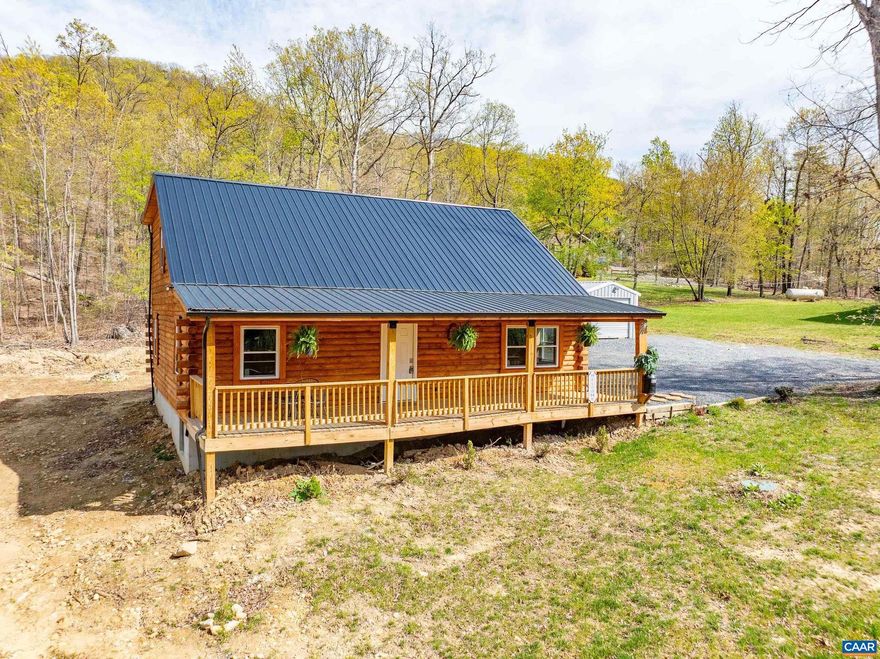 PRICED TO SELL! This 2024 log cabin offers spacious living with rustic charm, and features vaulted ceilings, sun-drenched rooms, and a spacious 12x16 back deck - perfect for entertaining and relaxing. 136 Wildwood Lane is located within Shenandoah Gap, which offers owners and guests 200 feet of direct access to the Shenandoah River and exclusive access to a 410-acre private wildlife preserve. Whether you enjoy fishing, kayaking, relaxing by the water, hiking, or hunting, the possibilities are endless and available to all owners. You can store all of your gear and toys in the oversized (12 x 21), heavy duty steel shed. Within 30 minutes of the cabin, one can also enjoy skiing, golfing, or water-park adventures at Massanutten Four Season Resort. Also nearby are multiple wineries & breweries, the Luray Caverns, and the Shenandoah National Park. Short-term rentals are allowed, so this cabin can be an ideal vacation home and/or a fantastic investment opportunity. Whether you?re looking for a peaceful weekend getaway, an adventure hub, or a turnkey rental, this mountain sanctuary delivers it all. Septic is designed for 6 ppl/3 bdrms.,Formica Counter,Hickory Cabinets