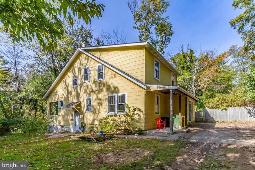 Very Spacious 2 Unit Home Located on a Private Court close to Morgan State University , Lauraville and Hamilton. Great Opportunity for an Investor or Live in One Unit and Rent the Other. The First Floor Unit has a Living Room, Dining Room, Den, Kitchen, Bedroom and Full Bath. Second Floor Unit has Living Room, Kitchen, 2 Bedrooms, Kitchen and Full Bath. There is a Washer and Dryer in the Lower Level that is Shared by Both Units also Plenty of Storage in the Lower Level. Large 1/3 Acre Lot.  Private Wooded Lot.