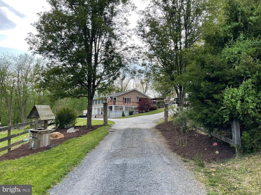 Charming Farmette in the Valley – Ready for Your Rural Dreams

**UNDERCONTRACT BUT BACKUP OFFERS WELCOME!!!

Whether you're a seasoned farmer or simply seeking your own peaceful slice of the Valley, this active farmette offers the perfect blend of functionality and charm. Currently home to sheep and chickens, the property boasts over 700 linear feet of fenced-in acreage—ideal for your choice of livestock or furry companions. Enjoy outdoor living at its best with a spacious deck, brick fire pit area, with a built-in cast iron cooker—perfect for entertaining family and friends under the open sky. The property also includes multiple outbuildings, such as a two-car garage, a single car garage and additional storage sheds, providing ample space for equipment, tools, and all your farming essentials.
Whether you're ready to work the land or simply relax and enjoy country living, this property is full of possibilities.