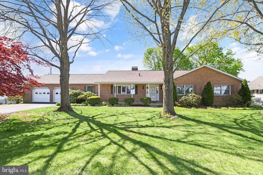 Well maintained custom built brick ranch home with 2 x6 construction and  elevated views in the heart of Hamburg.  Beautiful double sided fireplace highlights  the living room and den on the main floor.  Owners suite with private full bathroom and walk-in closet.  Bonus finished basement with 1/2 bath and ample storage and 2nd set of steps leading to the garage.  Screened porch to take in the almost half acre lot.    Great condition including a new roof in 2020.   Professional pictures coming soon.