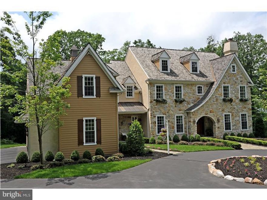 This stunning and sophisticated custom stone colonial, situated on a private 7.9 acre lot in Tredyffrin Township, offers an impressive exquisite design with meticulous attention to detail. Quality millwork, 10 foot ceilings, site-finished cherry floors, expansive windows & numerous architectural appointments abound through out this fabulous home.  Grand Foyer with a stately extra wide staircase; Formal Living Room with coffered ceiling & beautiful fireplace; Study with magnificent cherry millwork; elegant Formal Dining Room with glass french doors leading to Butler's Pantry;  state-of-the-art chef s delight Gourmet Kitchen with Thermador stainless steel appliances, large granite island and extra tall gorgeous cabinetry;  a striking two story sun drenched Morning Room with outside exit to slate patio;  Family Room with spectacular floor to ceiling stone fireplace flanked by custom built-ins; formal and informal powder rooms, mudroom with second access to basement as well as the three car garage complete this level. Double doors lead to the lovely Master Bedroom with tray-ceiling, separate sitting area, & luxurious Master Bath; two Bedrooms both with private baths, two Bedrooms sharing a J&J bath, and ample sized laundry room round out the second floor. Walk-up unfinished third level offers multiple options, including great storage. The finished lower level is perfect for additional entertaining and offers a media area, custom wet bar with granite, exercise room, powder room, an expansive workroom plus outside exit to a private covered patio. RECENT SUCCESSFUL TAX ASSESSMENT APPEAL!  New Assessment effective 2021: 634,550=NET SAVINGS of $6600+ on overall taxes. This stunning home is part of a small, private community that offers convenient access to a myriad of shopping and dining, TE schools, corporate centers, Valley Forge Park, Paoli Hospital, and all major commuting routes.  A must see for the most discriminating buyer!