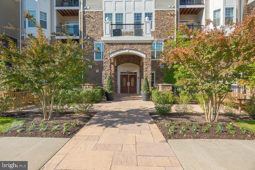 The Gatherings at Quarry Place located in Reisterstown, MD has a condo for you! Seller is offering help towards closing for the buyer. Sought after 55+ community offers you a beautifully maintained 2-bedroom, 2-bathroom condo. It is situated in a secure fob entry, elevator/intercom building on the 3rd floor. This 1390 sq ft condo has an in-unit laundry room; open concept; Livingroom with glass slider to a private balcony; beautiful gourmet kitchen with granite countertops, stainless-steel appliances, 42' cabinetry and pantry. Owner's suite has walk in closets with sitting area, bathroom with double vanity and shower with bench seating. 1-car detached garage. Amenities conveniently located right next to the condo building and include clubhouse with fitness center, outdoor pool and spa, dog park, vegetable gardens, outdoor grill and lakeside walking path. The community is located off of I-795 and convenient to Foundry Row shopping center, Marc station, and main street Reisterstown.