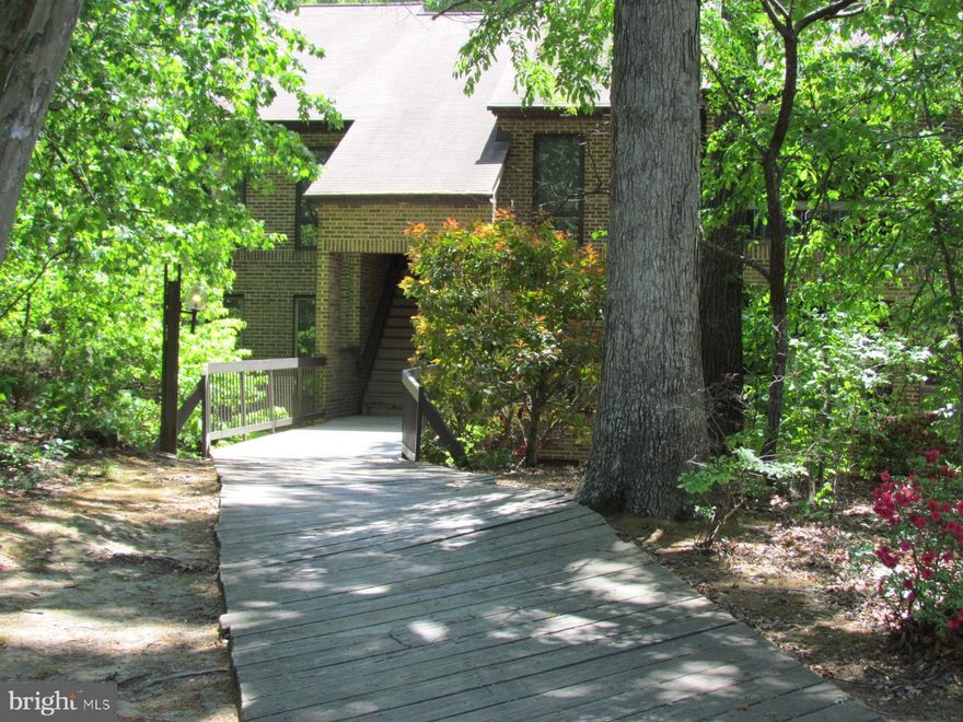 Mid-level, no stairs condo close to shopping, dining, Pax River NAS and entertainment, opening up to balcony with a wooded view. Galley kitchen,  full size washer/dryer. Full size hall bath, and half bath in primary bedroom that includes a walk in closet.  Additional ample closet spaces.  Pets, case by case, max of 25 lbs or less.,  No smoking, freshly painted ready for occupancy June 1