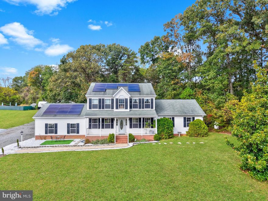 NO HOA! Paid off Solar Panels!   Welcome to your private retreat just minutes from the VRE and Park and Ride Lot, which has Omniride directly into DC! This beautifully maintained home boasts over 3,000 sq ft and sits on over 3 acres of land—half wooded and half cleared—offering the perfect blend of privacy and open space.

Inside, you’ll find a warm and inviting layout featuring recessed lighting throughout the kitchen and living areas, a propane gas fireplace, and a kitchen designed for both style and function with stainless steel appliances, black granite countertops, 42-inch brazilian cherry wood cabinetry, and a brand new dishwasher.

The spacious primary suite offers a true escape with a double vanity and large soaking tub. Step outside to enjoy the oversized deck overlooking your serene, partially wooded lot—ideal for entertaining, relaxing, or watching wildlife.

For the car enthusiast or hobbyist, this property features two double-car garages—one attached and one detached—with the detached garage including a car lift that conveys!

Additional updates and features include:

Septic system pumped in 2024

Solar panels providing savings of $300–$400 in summer and $100–$200 in winter

Pressure wash completed in 2025

Located less than 5 minutes from Brooke Station VRE, this property perfectly balances peaceful rural living with convenient access to commuter routes, shopping, and Downtown Fredericksburg.

Come experience space, privacy, and value—all in one exceptional property.