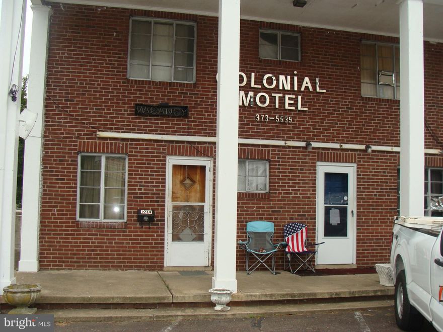 In the heart of Fredericksburg City this quaint motel was established in 1949. The lovely brick exterior was built to last. Offering 13 units, some the owner has started to renovate. Location is perfect for a stroll around the city. While staying at the motel make sure you experience the taste of Carl's Ice Cream founded two years before the motel was. There are wall units for AC 110 amp, and heaters have 220 amp outlets. Some rooms do not have wall heaters now. Delingi stand up heaters. All electric no heat pumps, water heater is gas.  New roof and gutters in the fall of 2024!  Location, location- Civil War History, George Washington family home as toured by Olde Towne Carriage Tours in the City of Fredericksburg, VA. Owner does not have P&L reports to provide or monthly income reports. Your chance to own a piece of history! Appointment only with owner, please no drive-ups, he is there by appointment.