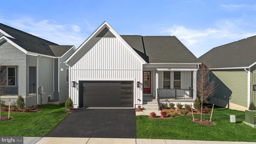 Step into the Sierra 39-F2 – Homesite 1035 at Hiatt Pointe—a two-car, front-load garage single family home with three bedrooms and three full bathrooms is move in ready IMMEDIATELY. Designed for ease and everyday function, this floorplan is as innovative as it stylish! Enter through the inviting front porch and be immediately welcomed by 9’ ceilings on both levels, oak main stairs, and expertly selected finishes that make this home truly one of a kind. The heart-of-the-home kitchen is complete with white soft-close cabinetry, quartz countertops, an oversized island with a built-in trash can, and a walk-in pantry with solid-shelving. The Samsung® stainless steel appliances—including a five-burner cooktop with chimney hood, single wall oven, refrigerator, microwave, and dishwasher—make every moment in the kitchen feel seamless and enjoyable. The open-concept floorplan invites you to unwind in the great room, where a cozy electric fireplace sets the mood for relaxing moments. Throughout the home, enjoy luxury vinyl plank (LVP) flooring on the main level and carpet on the lower level and secondary bedrooms, while the bathrooms offer ceramic tile flooring for timeless style and practical comfort. The main level primary suite includes a spa-inspired bathroom with dual vanities, soft-close cabinets, quartz countertops, a roll-in frameless shower with floor-to-ceiling tile, and elongated comfort-height toilets. For extra entertainment or hosting guests, the walkout finished basement offers a spacious rec area, an additional full bathroom, and one bedroom. The two-car finished garage with electric opener and exterior keypad adds daily convenience and extra storage. Built for comfort and sustainability, this home features smart home technology and energy-saving innovations, including a Home Automation Package with IQ Panel 4, Ecobee® smart programmable thermostat, tankless gas water heater, energy-efficient insulation techniques, and more. Plus, it’s solar panel ready—offering a seamless path to energy independence whenever you choose to take the next step. Take advantage of closing cost assistance by choosing Intercoastal Mortgage and Walker Title.----- Discover Hiatt Pointe at Snowden Bridge, a gated active adult community designed for 55+ living, where every day brings new opportunities to connect, unwind, and thrive. Start your morning with a yoga session or workout in the fitness center before joining friends for a game of pickleball or billiards. In the afternoon, lounge by the outdoor pool and hot tub, then gather around the gas fire table as the sun sets. The clubhouse serves as the heart of the community, offering inviting spaces for social events, group activities, and quiet relaxation. Outdoor kitchens and scenic patio areas set the stage for effortless entertaining, while a low-maintenance lifestyle ensures more time for what matters most. With easy access to Route 7, I-81, and I-66, Hiatt Pointe offers the perfect blend of resort-style amenities and a welcoming, connected community. -----*Other homes sites and delivery dates may be available. Pricing, offers, and availability are subject to change without notice. Images, renderings, and site plans are for illustrative purposes only and may not reflect actual homes or features. Some images and renderings may depict interior designs created in collaboration with AI or may represent a similar home. Additional terms and conditions may apply. Please see a Van Metre Sales Advisor for details.