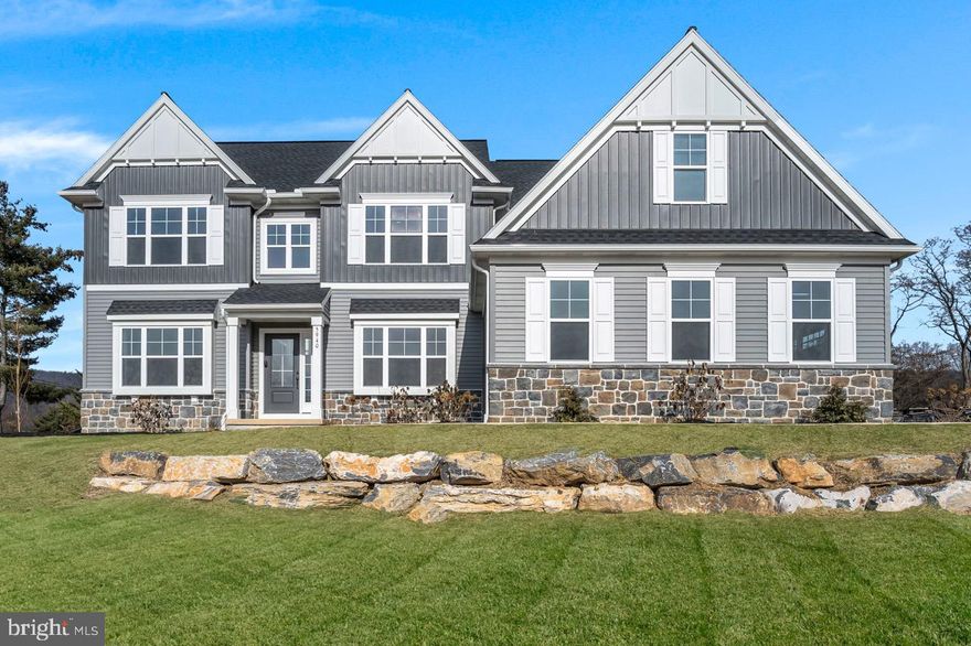 The Everett by Garman Builders is a 5 Bedroom, 5.5 Bathroom Home. This home has a guest bedroom and bathroom on the first floor. Along with a formal dining room and living room the home has a partially finished basement with a full bathroom