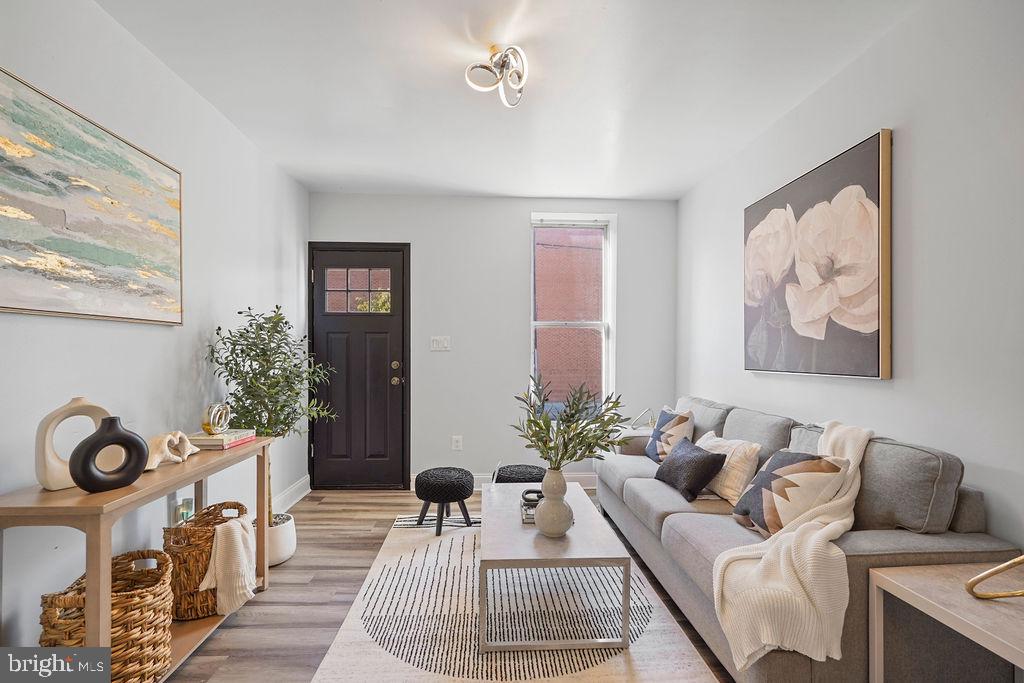 Welcome to this beautifully renovated home in the sought-after historic Pigtown/Washington Village neighborhood! This charming property features 2 spacious bedrooms, 1.5 updated bathrooms, and a modern kitchen equipped with stainless steel appliances, ample cabinet space, and a washer and dryer. The kitchen opens to a private deck and fenced backyard patio, perfect for grilling and outdoor entertaining.
Interior highlights include stylish vinyl flooring, high ceilings, recessed lighting, and a bright, open living room ideal for relaxing or hosting guests. The upper level offers two generous bedrooms and a renovated full bath, while the main level includes a convenient half bath. The full basement provides excellent storage or the opportunity to customize additional living space.
Located on a quiet street in the heart of Baltimore, this home offers city views and is within walking distance to Camden Yards, M&T Bank Stadium, Horseshoe Casino, the Inner Harbor, museums, restaurants, bars, and shops. Enjoy the best of urban living in this vibrant, walkable community. A true gem—don’t miss your chance to make it yours!