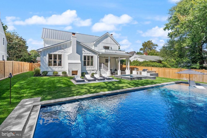 Stunning Modern Farmhouse in the coveted Berkshire Oakwood neighborhood.  Resort style living with all of the conveniences & amenities of N Arlington!  This is an unbeatable location, just around the corner from Nottingham ES & fields, 1/2 mile to Chestnut Hills Park, and under a mile to Harrison Shopping Center and Yorktown HS.  Just over a mile to the East Falls Church Metro!  Some of the high end finishes in this stunning home include: Brand new Avignon wide plank hardwoods, Wolf 60" 6 Burner Range, Wolf 30" Column Wine Storage, Subzero 48" Refrigerator/Freezer, Wolf built in Espresso Machine, Restoration Hardware light fixtures and Fire table, Sauna in Exercise Room, New Sun Bright TV on covered Patio.  The outdoor kitchen boasts Dekton countertops, Lynx appliances including 42" grill w/ Rotisserie and 30" Napoli Pizza oven.  The outdoor oasis continues with a 20x50 pool built by Luxury Pool Builder Lewis Aquatech, featuring a pebbletec brilliance finish, salt saline system and auto cover.  Plus a built in 10x10 Spa/Hot tub with the same finishes.  Enhanced by digitally controlled water features, lighting package, mature evergreens for privacy, 6' cedar fence, and sprinkler system.   The great room w/ soaring ceilings features accordion doors that open to the wide staircase down to the covered patio.  You won't want to miss this one!