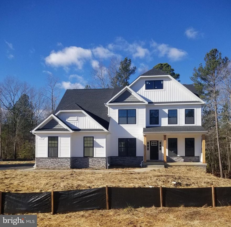 New Construction SPEC HOME - TO BE BUILT in Settle Woods Community on Lot 1-B, Elsa Avenue just off of Bensville Road in Waldorf, MD . BRAND NEW INCENTIVE!  $ 15,000.00 in any combination of  Closing Costs assistance or Interest Rate Buy-Down.  with the use of one of our Preferred Lenders and Affiliated Title Company.  Built by Marrick Homes. Property is .62 Acre  for a Walk-Out Basement with plenty of yard space.  Price Includes:  4 Bedrooms, 3 1/2 Baths,  2-Car Front Load Garage, Quartz Kitchen Countertops, Luxury Vinyl Planks, Stainless Steel Gourmet Upgraded Appliances, Upgraded Cabinets throughout Kitchen & Baths, Separate Large Owner's Shower & Soaking Tub in Owner's Bath, plus many more upgrades throughout the home.  House Pictures are for Rendering and Advertising Purposes Only and are an example of the Model Advertised. The Home will have a Front Load Garage.  We can build any other of our offered models on this property as well.