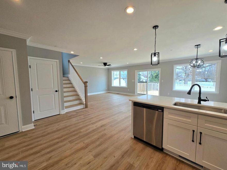 Home is currently under construction - Completion date January 2026. BRAND-NEW CONSTRUCTION NOW AVAILABLE IN SOUGHT-AFTER RIVIERA BEACH. WATER PRIVILEGED COMMUNITY WITH BOAT RAMP AND FINISHING PIER. OVERSIZED GARAGE. TONS OF NATURAL LIGHT. TWO ZONE HVAC. LUXURY VINYL FLOORING THROUGHOUT. ENJOY CUSTOM WHITE CABINETRY, IMPORTED TILE, UPGRADED TRIM AND PAINT PACKAGE, GORGEOUS QUARTZ COUNTERTOPS, SS APPLIANCES IN DESIGNER CHEF'S KITCHEN WITH GIGANTIC ISLAND. OVERSIZED FAMILY ROOM WITH LARGE DINING SPACE. HIGH CEILINGS. SPACIOUS 4 BEDROOMS WITH 2.5 BATHROOMS. UNFINISHED BASEMENT WITH FULL BATHROOM ROUGH-IN. CLOSE PROXIMITY TO LOCAL DINING, RETAIL SHOPPING, AND MAJOR HIGHWAYS. SCHEDULE A PRIVATE TOUR TODAY. BUILDER SAMPLE PHOTOS.