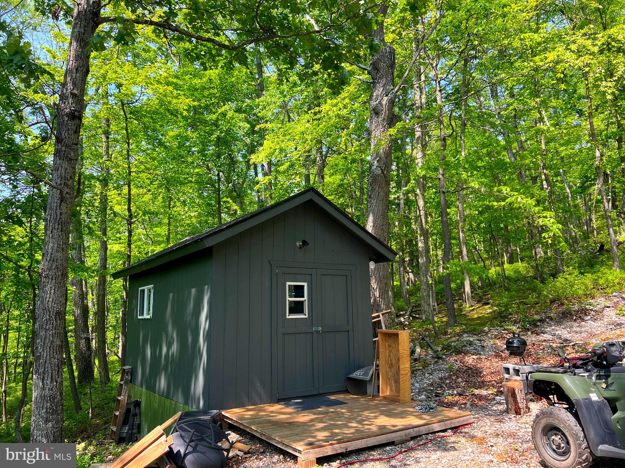 Looking for a private mountain get away? This beautifully wooded tract is ready for you to settle in and enjoy hunting, hiking and more! When you own a lot in the "High Knob" area you also have ownership in the three interior community "parks" that afford a pond and picnic area, a rock ledge overlook for panoramic sunset views, and a path to "High Knob" for views of the valley below from Saddle Park.