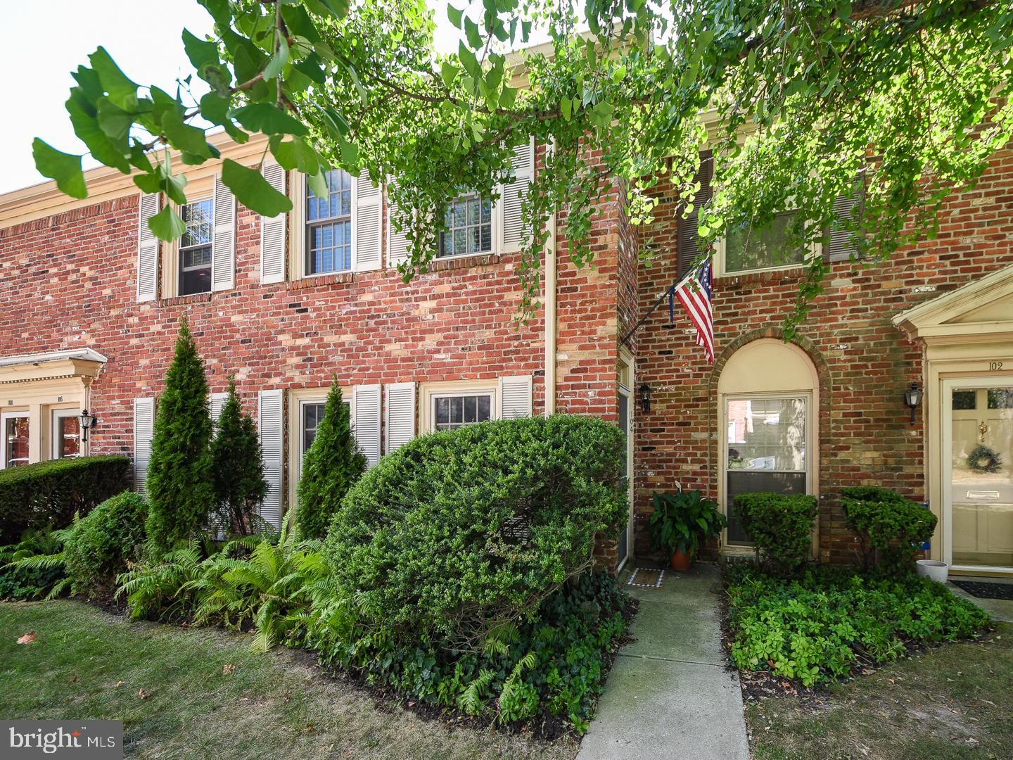 For All Your Tomorrows!! Stunning brick townhouse in beautiful, picturesque Georgetown of Philadelphia—an idyllic setting with lovely open areas and mature trees. This delightful home offers new carpet throughout plus new paint in living room and stairway. The living room has a spacious built-in. The tastefully remodeled kitchen is a treasure—with rich cabinetry, granite counters and stainless appliances. The striking ceramic tile floor definitely has the “wow” factor. This sunny area has a lovely, large window and attractive sliding door. Through the sliding door is your enchanting, “secret” garden with attractive plantings and a marvelous pond area with a small waterfall—all fenced in for privacy!! What a special place to “linger awhile” away from the “hustle and bustle”!! The hall bath has also been remodeled with stunning upgrades. And the abundance of community amenities provides something for everyone including a refreshing pool for those hot, sticky days, a clubhouse for social gatherings and events plus a tennis/pickleball court for a fun game. Imagine the Penllyn Train Station within walking distance for those trips into the city!! And of course, the nearby shops and restaurants are there to enjoy including wonderful Ambler. What a perfect place to call “home”!