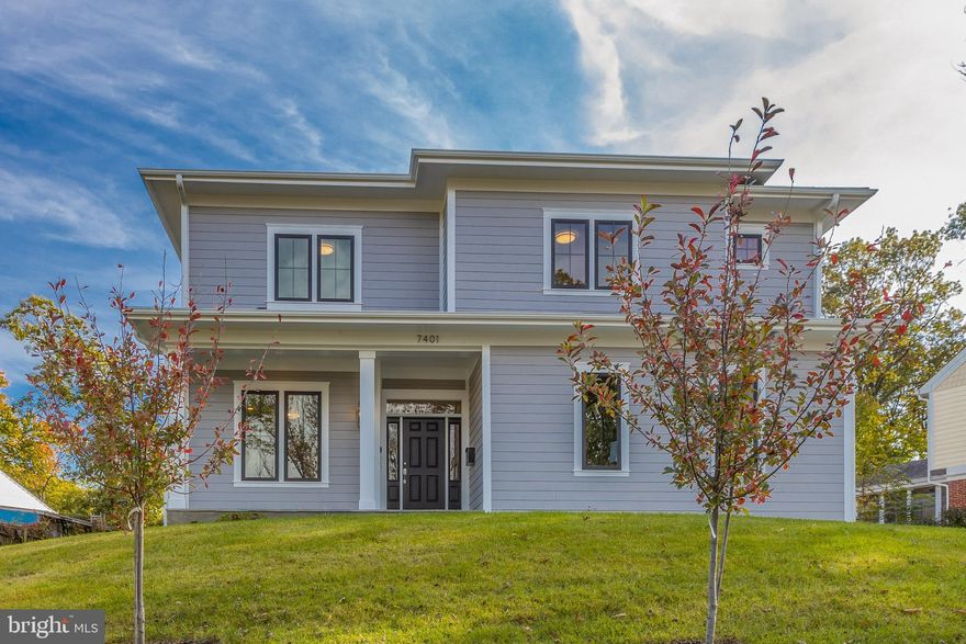 Great New Price on this wonderful custom home!  With heating and cooling bills of about $100-$125/month, this is the home for you!  Set on a hill in sought after Poplar Heights, you will find this exquisite custom built Transitional Style home with nearly 5200 sf of finished living space.  As you enter the home you will be impressed by the thoughtful design.    The beautiful wide plank wood floors will call your attention.  Your eyes will be drawn up to the 10' ceilings and note the crown moldings.  Next you'll spot the "flex" room just of the foyer which features glass doors, a closet, and a full bath allowing it to serve as either a first floor bedroom or convenient home office.  There is also a half bath on this level for guests.  Should you come in off the driveway you'll find the always needed mudroom equipped with cubbies, hooks, and a bench.  As we reach the rear of the house you notice this home features beautiful windows that illuminate the stairwell and the open great room.  The great room is a space where you can relax and enjoy the warmth of the gas fireplace, dine under the designer chandelier, or entertain large gatherings.  A NEW deck has just been added off the back of the home.   Details taking front and center, your eyes will be drawn up to the magnificent coffered ceilings.    Finally you arrive at the ultimate luxury -- the sumptuous chef's kitchen!  Nothing has been overlooked here, from the oversized island crowned with quartz counter tops to the stainless steel Bertazzoni appliances including a 36 inch range, wall oven, microwave, dishwasher, and refrigerator; this is the gourmet kitchen of your dreams.  The large pantry gives you plenty of space to store all those extra items you need during the pandemic!   As you head upstairs you will be stunned by the large windows overlooking the side yard and bringing in an amazing amount of light.  The beautiful wood floors continue upstairs and lead straight into the gracious owner's suite.  Looking up again you will be impressed by the gorgeous tray ceiling.   The over-sized walk-in closet will be sure to please.   As you enter the bathroom you can feel the spa experience.  From the impressive walk-in shower to the gorgeous soaker tub to the two vanities, you'll know it is a place for you to relax and unwind.   Down the hall there is a spacious laundry to make your days easier.  The second bedroom features its own en suite bath. The third and fourth bedrooms share an innovative Jack and Jill bath.  From each room  you enter a bath with its own sink and commode.  The shower is shared between the two baths, allowing each occupant their own space when needed.   All the bedrooms feature large closets with plenty of storage.  Downstairs you'll find the 6th bedroom with a buddy bath.   The main recreation space includes a wet bar--perfect for entertaining.   There is also a media/exercise room on this level.   Rounding out the package is the excellent location.  This home is close to the East and West Falls Church Metro Stations, major commuting routes, Tysons Corner, and downtown Falls Church City with all the restaurants and amenities it has to offer.  And just down the street, the W&OD bike trail is there for your enjoyment!  You won't want to miss this one.