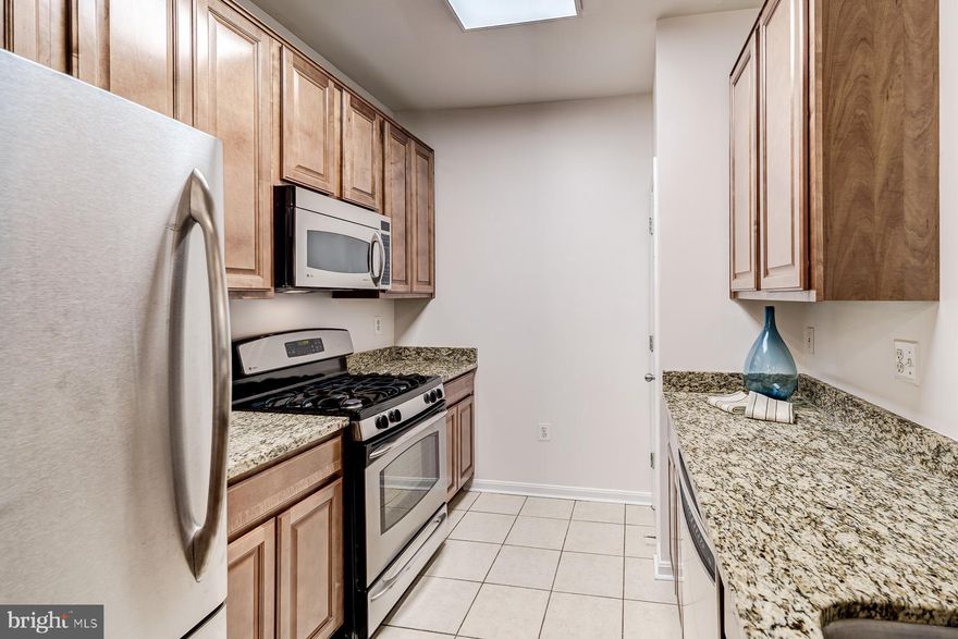 THE EXCHANGE AT VAN DORN is your new home!  This lovely 1 BR/1 BA boasts a reserved, covered parking spot, 9 foot ceilings, 42" maple kitchen cabinetry, crown molding, Luxury Vinyl Plank flooring, granite countertops, stainless steel appliances, in-unit laundry and tons of closet/storage space. FRESHLY PAINTED and ready for its new owner!  

Amenities include pool, exercise rooms, billiards room, indoor basketball court, tot lot, dog park, and shuttle to Van Dorn and Eisenhower Metros! Perfectly situated inside the beltway, 3 miles from Old Town, 3 miles from 395 and 1/4 mile from 495!

COMES WITH A ONE YEAR HOME WARRANTY!  Condo fee includes water and sewage.