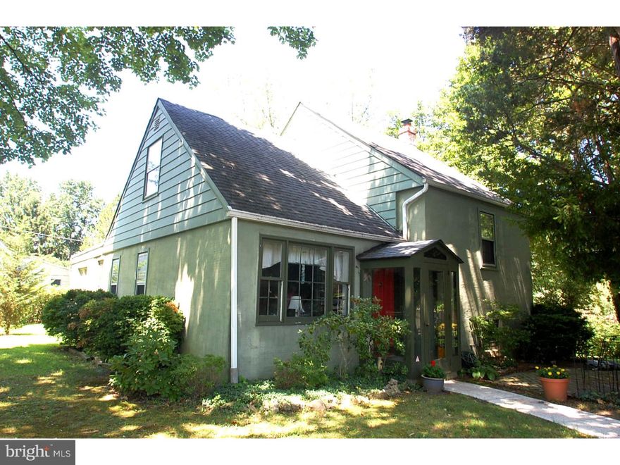 Charming Andorra multi-level cape in perfect location with a double lot. Enter through the front vestibule to a large living room with triple window, hardwood floors throughout (under carpet in bedrooms) with exception of kitchen. Formal dining room opens to kitchen with breakfast area, built in pantry storage, custom cabinets, corian countertop, gas cooktop and built in convection microwave. Upper levels have 4 bedrooms with 2 full baths and plenty of storage. Lower level has family room and laundry.  Nice size deck off the kitchen is great for entertaining with expansive back and side yards, mature trees and new custom shed. Fully fenced in yard with plenty of street parking in a quiet neighborhood convenient to parks, shopping centers, public transportation, major roads and college universities.