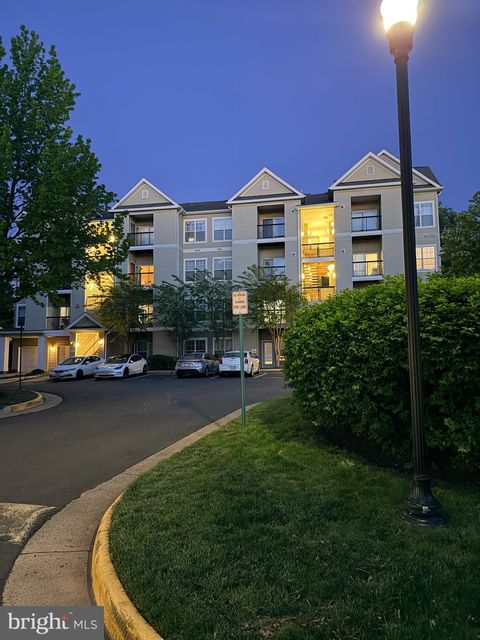 Photo of 5115 - E Travis Edward Way #E, CENTREVILLE, VA 20120 (MLS # VAFX2307140)