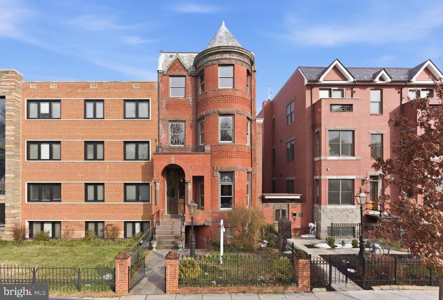 Situated on the largest lot on Logan Circle, this rare 23-foot-wide bay-front Victorian offers exceptional scale, flexibility, and over 5,000 square feet of living space—complete with an in-ground 11’ x 36’ lap pool. The home was completely renovated approximately 30 years ago, with much of its original detail and charm thoughtfully restored, and now presents an excellent opportunity for its next renaissance.

The main residence spans approximately 3,600 square feet and features 11-foot ceilings on the first floor. A grand main level includes a formal living room, parlor, and an expansive dining room that comfortably accommodates dinner parties of 20 or more guests.

Upstairs, the home offers four bedrooms, each with its own en-suite bath. The second floor features two spacious primary suites, both appointed with soaking tubs and separate showers.

The outdoor space is equally impressive. A large patio sits just off the pool, while an elevated terrace overlooking the water provides the perfect setting for sunbathing or relaxing.

The terrace level includes two separate apartments—a one-bedroom, one-bath unit and a studio—offering excellent potential for guests, rental income, or flexible living arrangements. The property also includes one-car parking.

This is a truly unique opportunity to own one of Logan Circle’s most distinctive and expansive homes.

Note: Some listing photos may include digital enhancements or staging to illustrate potential uses of the space.
