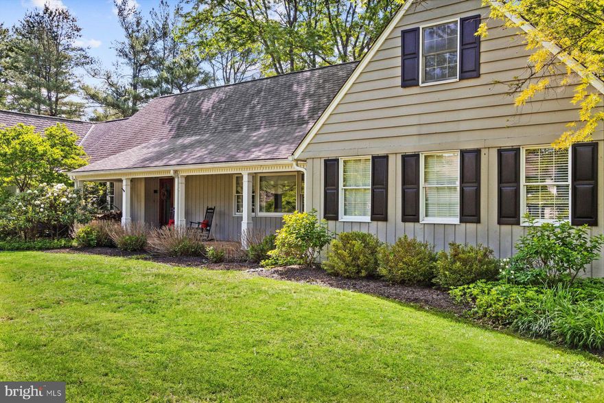 Spacious aptly describes this lovely Cape style home on a welcoming 1+ acre beautifully landscaped lot of mature & ornamental trees and is in one of Upper Makefield’s most cherished neighborhoods. A coveted enclave of distinctive homes built by highly respected builder Ferman Lex creates a wonderful environment with pleasant surroundings. Each residence offers their own charming character, adding to the uniqueness of this very special community. A serpentine brick walkway leads you to an expansive covered rocking chair front porch. Well-proportioned rooms are a hallmark of the home. Extensive use of crown moldings, attractive cherry flooring throughout the first floor add to its enjoyable qualities and upgraded touches provide eye-catching visuals. A sense of subtle symmetry is evident as you move from one room to another. Thoughtful placement of the windows brings the outside in with sweet views in all directions. The double door entrance opens to the foyer with vaulted ceiling and central staircase. The living room with picture window offers bookcases or shelving for your collectibles. The formal dining room with large window, crown molding & chair rail is a great place to celebrate holidays & special occasions. A large center island kitchen with granite counters, copious cabinetry, stainless appliances and a huge walk-in pantry & convenient adjacent laundry features a separate breakfast area with bay window & door leading to the rear yard. A half bath is located between the family room & kitchen. The family room with impressive stone mantled fireplace, high hat lighting has custom built in cabinetry, undercounter storage and a wet bar sink. It is a step away from an enclosed porch with wraparound windows & vaulted skylit ceiling overlooking the welcoming pool area. French doors off the living room move you to a wonderful bonus feature as both the Primary bedroom and a separate ensuite bedroom are separated by a well-planned hall providing the ideal space as a guest or au pair room with its own door to the front porch.  The primary bedroom with French door to rear patio features a luxurious bath with wainscoting, double travertine vanity, Restoration Hardware mirrors, oversized custom shower, with seamless door, separate whirlpool soaking tub and a huge walk-in closet with custom built-ins. The ensuite first floor bedroom offers a Travertine bath with oversized shower, custom door, pedestal sink. The second-floor hall of this remarkable home features oak hardwood floor and offers 3 sizeable bedrooms, all with wall-to-wall carpeting, oversized and/or walk-in closets and expansive windows. A large hall bath on this floor provides a granite vanity with two undercounter sinks, Kohler tub with shower, subway tile surround & custom glass door and utility closet. A private rear yard surrounded by lush shrubbery, perennials, herb garden plot & majestic trees provide an oasis & respite with its inviting inground -pool with custom retractable cover. It is surrounded by an expansive apron and a flagstone patio offering the perfect place for relaxation, whiling away the day, fun gatherings or evening soirees. An attached 3 car garage, huge full basement for storage, zone heating & air-conditioning (Brand New compressors) and a generator add to its value. This fine home is conveniently located in a breathtakingly beautiful historic area of many preserved farms & parks and minutes to New Hope-Lambertville’s cultural events, fine restaurants, shops. Love where you live!  Easy access to Princeton, Philadelphia & New York.