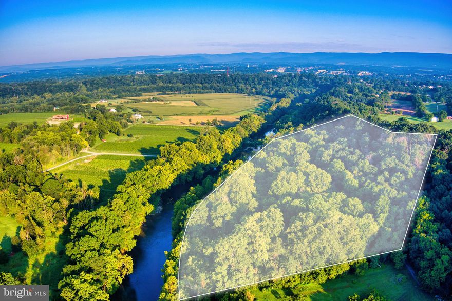 14.069 acres bordering the beautiful North Fork of the Shenandoah River!  Approximately half of this mostly wooded property is outside of the flood plain and it features 1258 feet of river frontage!  The property offers the best of both worlds; seclusion and privacy and the convenience of being just a few minutes from the Town of Woodstock and I-81.  Walk to Muse Vineyard, Seven Bends State Park, and the George Washington National Forest.   

Only buyers accompanied by agents should enter the property.  Do not drive onto the Right of Way that runs through the property, park in the parking area by the river and walk the property. Certification Letter for a 3-Bedroom Conventional Septic System was recently obtained from the Virginia Department of Health.

New survey completed shows acreage is 14.069 - to be recorded at closing.