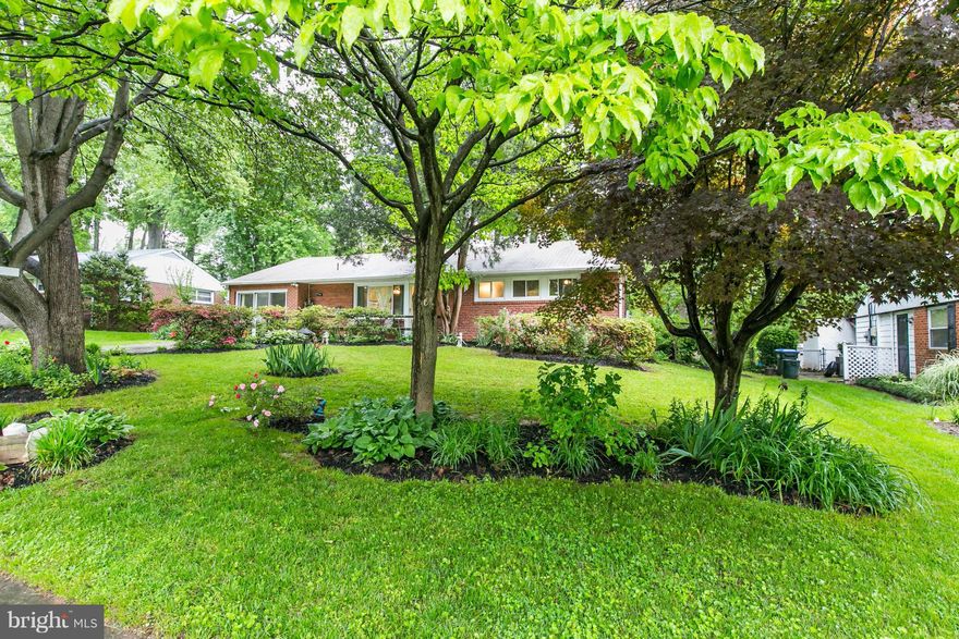 From its curb appeal & excellent back yard ambiance to its customized addition this home creates a beautiful environment for both entertainment & tranquil/comfortable 1 lvl. liv. space inside Beltway.Beautiful brick rambler 3BR 1.5Baths updated kitchen, hardwood floors throughout, fireplace, recessed lighting, freshly painted, new carpet - must see!