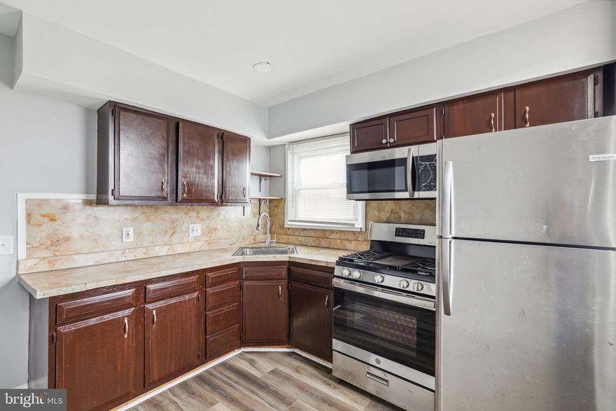 Welcome to the newly renovated 1200 N 64th Street Unit B! Enter the open living space, with high ceilings, new LVT flooring, and large windows bringing in tons of natural light. Continue through the space down the hallway to two nicely sized bedrooms, each with tall ceilings, spacious closets, and ceiling fans. Follow the hallway to the full bathroom, complete with a tub shower combo. The rear of the apartment features the kitchen, with stainless steel appliances and plenty of counter space and cabinetry. The rear door provides access to the patio space, perfect for grilling and entertaining.
Located near Morris Park, 69th Street Station, and tons of shops and restaurants, this apartment won’t last long. Schedule your tour today!