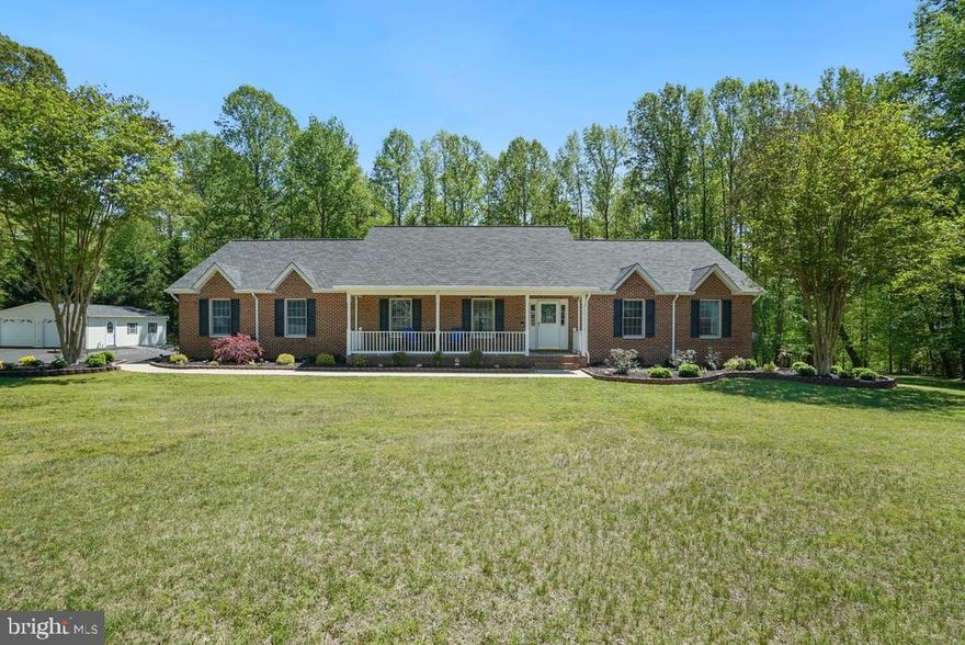 If your heart is where your home is, this 2001  custom built rambler is not
your average cookie-cutter home; but, rather a unique , one-of-a-kind
design; nestled on 3.2 acres and backing to woods with paths leading to a
flowing creek, it offers 3,500 sq ft of living space, four bedrooms, and three full
baths, plus a full walk-out basement with an in-law apartment complete with
separate entrance, kitchen, and laundry—perfect for multi-gen living or potential rental
income. The original owners have ensured that their pride of ownership transcends
every aspect of their home. Also showcasing an oversized flex area, huge walk-in
cedar closet and plenty of storage space for all. Also in the basement you will
appreciate the fully finished mechanical room with an oversized well tank and core
utilities. The basement includes a 2nd separate stairway leading up to the 2
1/2 car - attached garage which is brightly lit and has a concrete floor sealant. A huge bonus is the detached 24 x 28 Amish-built shed garage with electric. Additional highlights include an energy-efficient 4-zone geothermal heat pump with a "desuperheater" and preheat water tank for almost limitless abundant hot
water, Anderson tilt-wash double-hung argon filled windows with argon and energy
efficient Low-E glass, large "over garage" attic with built in shelving and full access
stairwell, Quartz and granite counters in the kitchen and baths, central vacuum, water
softener, concrete patio, driveway entry alarm, heat and glow gas fireplace, extensive
up-to-date remodeling (2025- a new extended driveway, 2024 - new hardwood floors,
two remodeled bathrooms, 2023 - new roof with designer architectural shingles, 6- inch
gutters, shutters, new garage openers and full home landscaping with yard lighting;
2021 - MIL remodel; 2019 - replaced and upgraded geothermal heat pump; 2015 - kitchen remodel ), and a location close to military bases, shopping, restaurants, schools,
and the library, making your tour a truly extraordinary, one-of-a-kind experience.