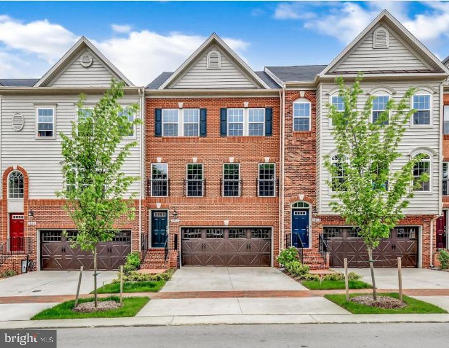 Beautiful 4-level home with rooftop loft and terrace, 3 large bedrooms with huge walk-in closet, 2 full bathrooms, 3 half bathrooms, all within an open-concept floor plan covering 2950 sq ft. The oversized kitchen includes dual granite islands, stainless steel appliances, a walk-in pantry, a deck, and a fenced backyard with a large patio and exterior ring cameras.  Hardwood floors adorn the main level, complemented by recessed lighting and electronic window blinds. The lower level features a rec room with a half bath, as well as a two-car garage that includes a storage room and a deep freezer. There is ample parking space available for guests in the nearby visitors' lot. This home is situated in a desirable golf course community that features a swimming pool, restaurant, and other amenities.