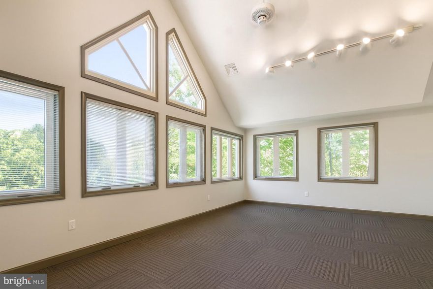 Discover an outstanding opportunity to own a professional office suite at 5661 Columbia Pike, Falls Church, VA, located in the heart of a thriving commercial corridor. Part of the Rock Spring Professionals complex, this space benefits from ongoing revitalization throughout the Bailey’s Crossroads area of the Mason District.

This 978 sq. ft. top-floor suite offers excellent visibility and convenience. The open layout features vaulted ceilings, a private office, and a large half-bath, making it adaptable for a range of professional uses. Its corner position with windows on three sides fills the space with abundant natural light, creating a bright, inviting work environment.

Can be offered fully furnished with desks, the suite is truly turn-key—ready for immediate occupancy. Generous parking is available for both clients and staff.

Position your business for success in this prime location today.