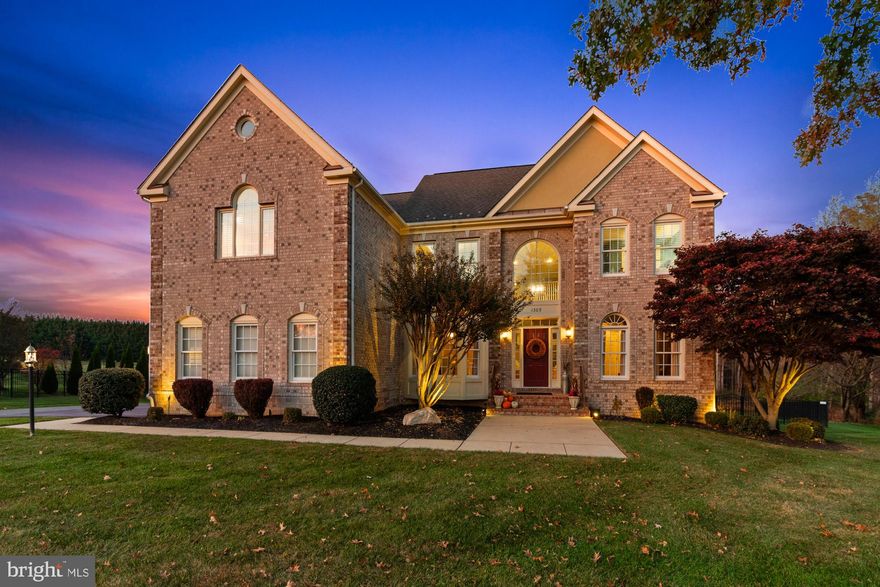 Located in the highly desirable Willow Chase community, this 5-bedroom, 3.5-bath Colonial with over 5,000 finished Sq ft sits on a premium .89-acre lot, backing to common area for added privacy. The exterior features professional landscaping, a fenced-in backyard, and an oversized three-car garage, offering both curb appeal and functionality.

The main level showcases a grand two-story foyer leading to an expansive family room with a two-story wall of windows and a gas fireplace. The open floor plan includes a private home office, formal living and dining rooms, and a spacious sunroom with vaulted ceilings. The updated kitchen features granite countertops, a large island, modern appliances, and ample cabinetry, while a walk-in pantry and adjacent laundry room add to the home’s efficiency.

The fully finished lower level is designed for entertainment and additional living space. It includes a home theater room, a full wet bar with appliances that can function as a second kitchen, a large recreation area, a private 5th bedroom, and a full bath.

The upper level offers four generously sized bedrooms, including the owner’s suite, which features a sitting area, an expansive walk-in closet, additional closets, and a spa-like bath with a soaking tub, dual vanities, and a separate shower.

This property is situated in a well-established neighborhood with convenient access to shopping, dining, and top-rated schools. With a premium lot, exceptional interior features, and extensive living space, this home presents a rare opportunity in Willow Chase.