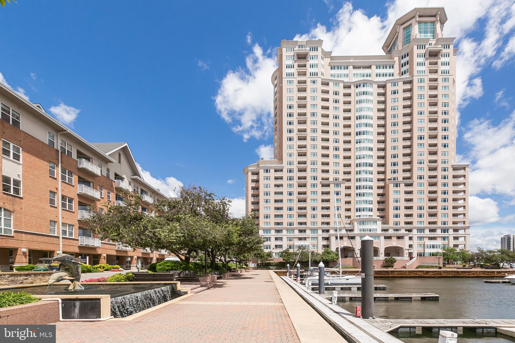 IMPRESSIVE BREATHTAKING VIEWS capture the Inner Harbor waterways and exciting city life all while in the comforts of home!! Exceptional 1BR plus private den perfect for home office or 2nd BR, 1.5BA's! Open floorplan with 1,129 sf and two balconies overlooking Baltimore’s Inner Harbor, Federal Hill, Pier VI and the Harbor Gateway. Spacious open LR area, Galley kitchen with stainless appliances, lots of countertop, cupboard and pantry space. Stylish features abound including luxury vinyl plank flooring throughout, built-in sound system, California closets, crown molding, recessed lighting, incredible views from each room! Main Suite offers custom designed walk-in closet, private bath with shower plus Jacuzzi tub, marble tile stall shower pan! Price includes gated garage parking (one assigned space) and plenty of guest parking! Array of building amenities and services for added comfort, luxury and value! 24/7 front-desk concierge, state-of-the-art fitness center, business center, newspaper delivery service, outdoor grill area, social lounge, indoor pool, steam/sauna, guest suites and bike storage. The Harborview Marina & Yacht Club Community offers you the exciting and comfortable lifestyle you deserve! Beautifully landscaped grounds with many water features and park-like sitting areas, brick paved walking/jogging paths, onsite security staff, gourmet deli, and outdoor pool! Close to public transportation, I-95/695, International Airport, MARC, Inner Harbor, Business District, Stadiums, Harris Teeter, Cross Street Market, Baltimore Peninsula, Stadium Square, Federal Hill, Riverside, Rash Field and Locust Point parks, gourmet restaurants and exciting nightlife! A MUST SEE!!