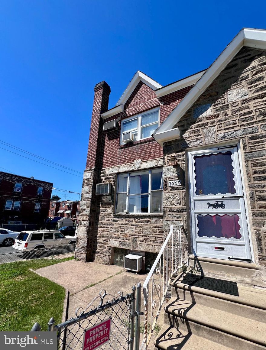 A diamond in the rough. This oversized end unit in sought after Mayfair is the perfect place to gain some sweat equity. Whether you are looking for a new home, to convert into a duplex or have a home business out of the walk out basement the possibilities are endless. Enter through the double door entry into a nice sized living room with the original hardwood flooring. Follow through to the large dining area and kitchen with sliding doors to  the deck. Head upstairs to find a primary bedroom, 2 additional bedrooms and a 4 piece hall bath with skylight. In the basement you will find that the garage has been converted into an enclosed room, a 3 piece bathroom and both a side entry and rear entry to the two off street parking spaces. Whether an investor or a DIYer this home could be your next project.