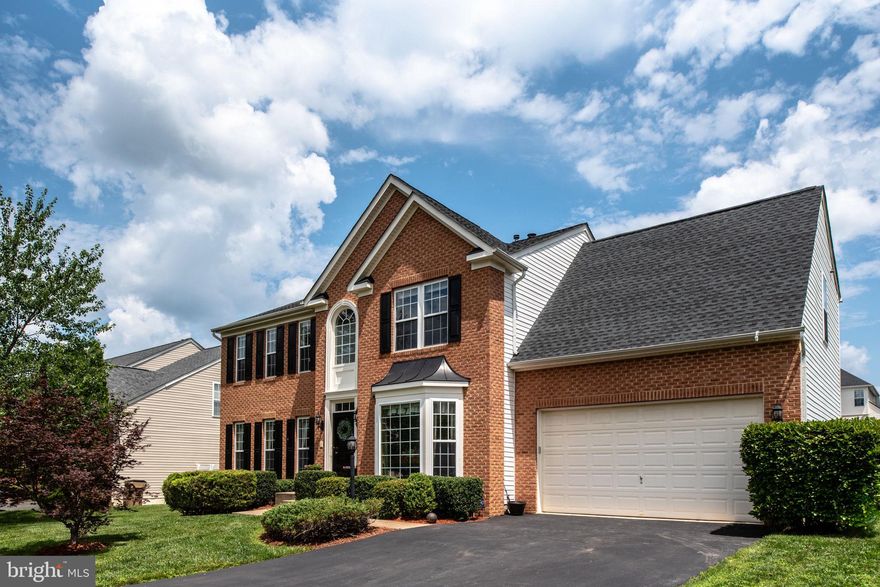 ABSOLUTELY STUNNING 5 BR, 3.5 BA BRICK FRONT COLONIAL WITH OVER 3100 SQ FT ON TWO LEVELS ON HUGE FENCED LOT AND JUST LOADED WITH UPGRADES! Gleaming hardwoods and 9 ft ceilings throughout most main level living areas. Adjacent to the foyer is an elegant study to the left and formal dining room to the right adorned with chair rail, crown molding, tray ceiling and sun-capturing bay window. The main floor continues to captivate with an open concept kitchen, family room and morning room. The gorgeous gourmet kitchen is a chef's delight featuring a spacious brand new quartz island and counter tops with bar seating, upgraded SS appliances, gas double oven and tons of cabinet space. The sun-splashed morning room off the kitchen has a vaulted ceiling, fan, wall of windows and leads to a delightful custom deck with gazebo overlooking the huge, level fenced back yard. The family room off the kitchen has hardwoods, gas fireplace with custom mantle and lighted ceiling fan. The second level features five bedrooms and 3 full baths. The elegant primary bedroom with vaulted ceiling and fan features 2 closets (one a walk-in) and cozy sitting area with arched window. The ensuite primary bath has vaulted ceiling with separate shower and jetted soaking tub. The extra-large second bedroom has its own private full bath. The final features of the upstairs include 3 bedrooms and guest bath. The partially-finished walk up lower level is fully-framed, insulated, wired and has rough-ins for a full bath, gas fireplace and potential full wet bar or kitchen with the ability to make the home  over 4,500 square feet once completed. Upgrades include upper & lower HVAC units (2020), hot water heater (2019), kitchen appliances (2018), fence (2019), shed (2019), refinished hardwoods (2023), Quartz kitchen counter (2023) and updated sprinkler system (2022/2023). Additionally, you'll love outdoor living with the spacious deck, gazebo and flat fenced yard with a huge custom shed for storage. Colonial Forge High School pyramid (which includes Rodney Thompson Middle School). Short distance to Rodney Thompson's fields (football, baseball, track, tennis courts & nature trail). Just minutes to Quantico, Ft Belvoir and the VRE station and express lanes to DC. Area shopping includes Stafford Marketplace and Embrey Mill Town Ctr w/Publix Grocery, including parks, library and dining. This one is truly a 10++!!