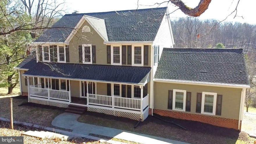 Move-in ready 4 bedroom, 2.5 bath three-level Colonial set on a beautiful 1.72 acre lot just minutes from the historic town of Warrenton. A welcoming full-length front porch leads into a spacious main level featuring a living room, formal dining room, and private study with fireplace and gas log. The comfortable family room offers a fireplace with woodstove insert and opens to a well-appointed kitchen with ceramic tile floors, maple cabinetry, granite countertops, pantry, and breakfast nook. A powder room and mud/laundry room with access to the two-car garage with epoxy-sealed floor complete the main level.
Upstairs, the primary suite includes three closets—two walk-ins—and an updated bath with lighted mirror, walk-in shower, and toilet/bidet. Three additional bedrooms and a full hall bath complete the upper level, with all bathrooms recently updated. The unfinished walkout basement offers excellent storage or future living space potential. Fresh interior paint and refinished wood flooring add to the home’s move-in ready appeal. Outdoor living is easy with a large deck and patio perfect for entertaining while enjoying the privacy of the 1.72-acre setting. Conveniently located near shopping, dining, and major commuter routes.